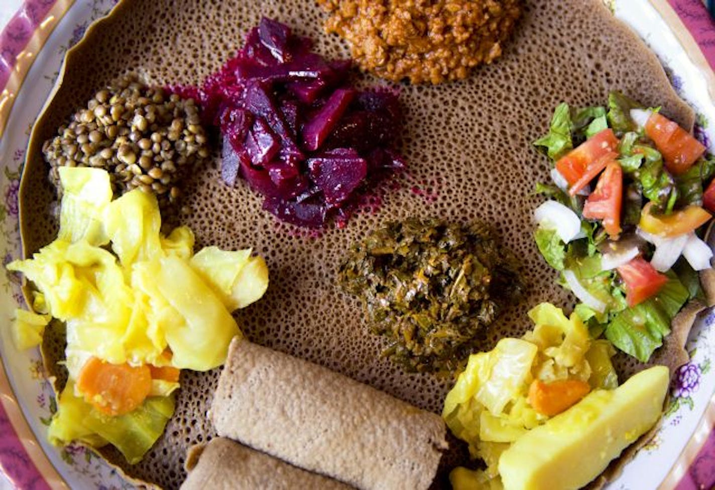 Spongy injera bread is the platform for this all-vegetarian platter at Flamingo Restaurant.