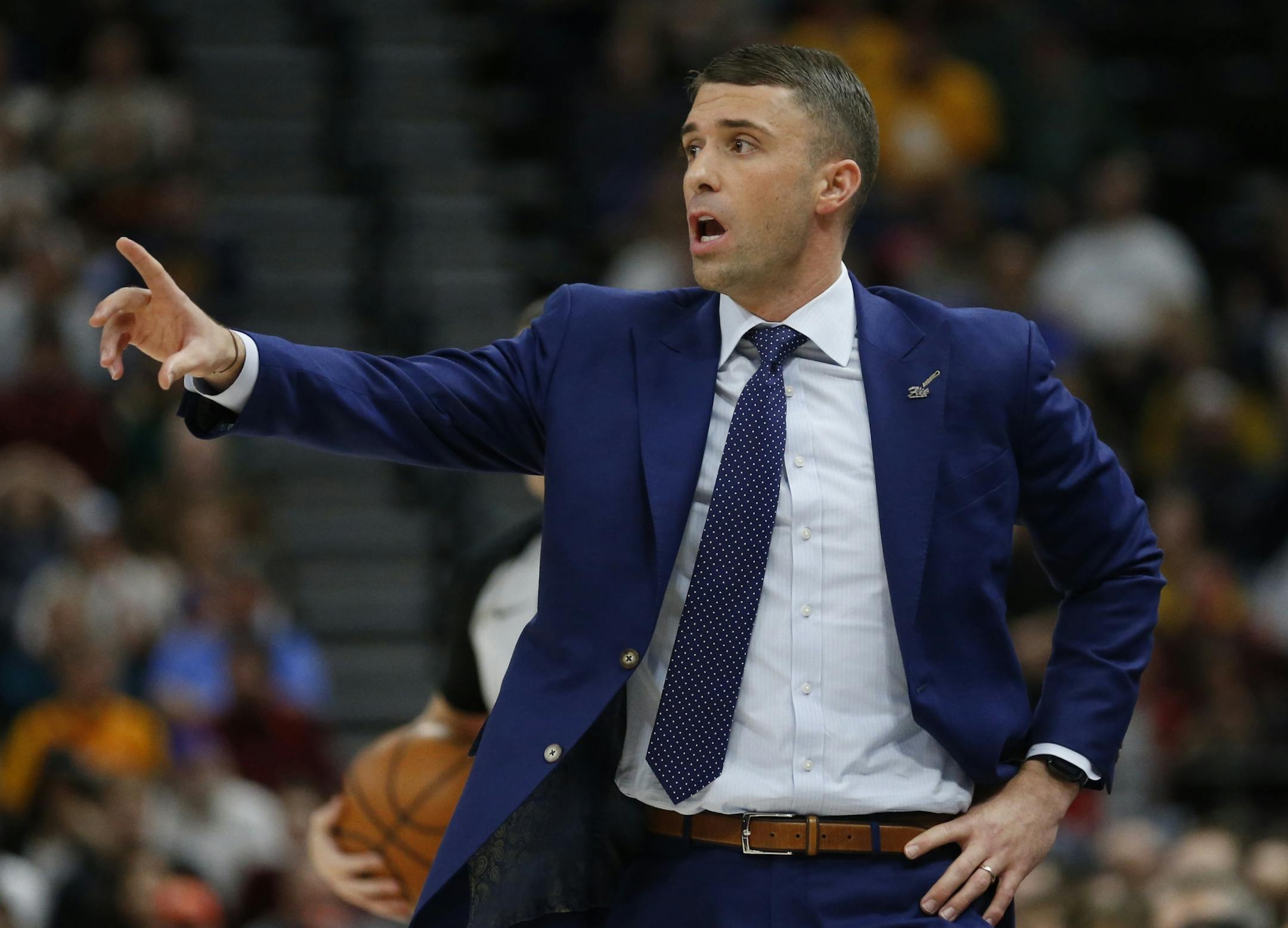 Minnesota Timberwolves coach Ryan Saunders directs his team during the first half of an NBA basketball game against the Utah Jazz on Friday, Jan. 25, 2019, in Salt Lake City.