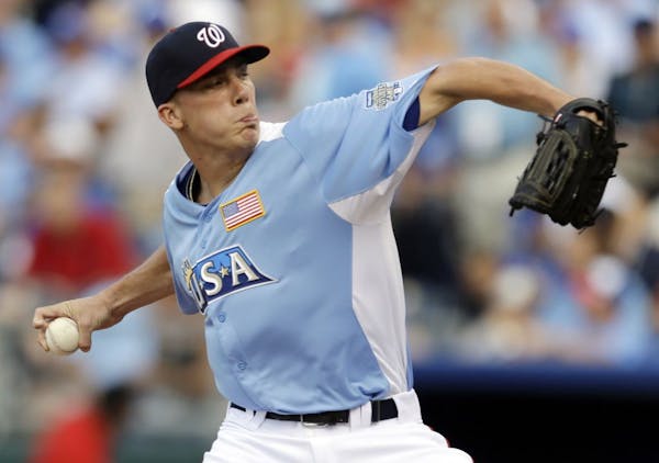 Alex Meyer delivers during the seventh inning of the MLB All-Star Futures game in July.