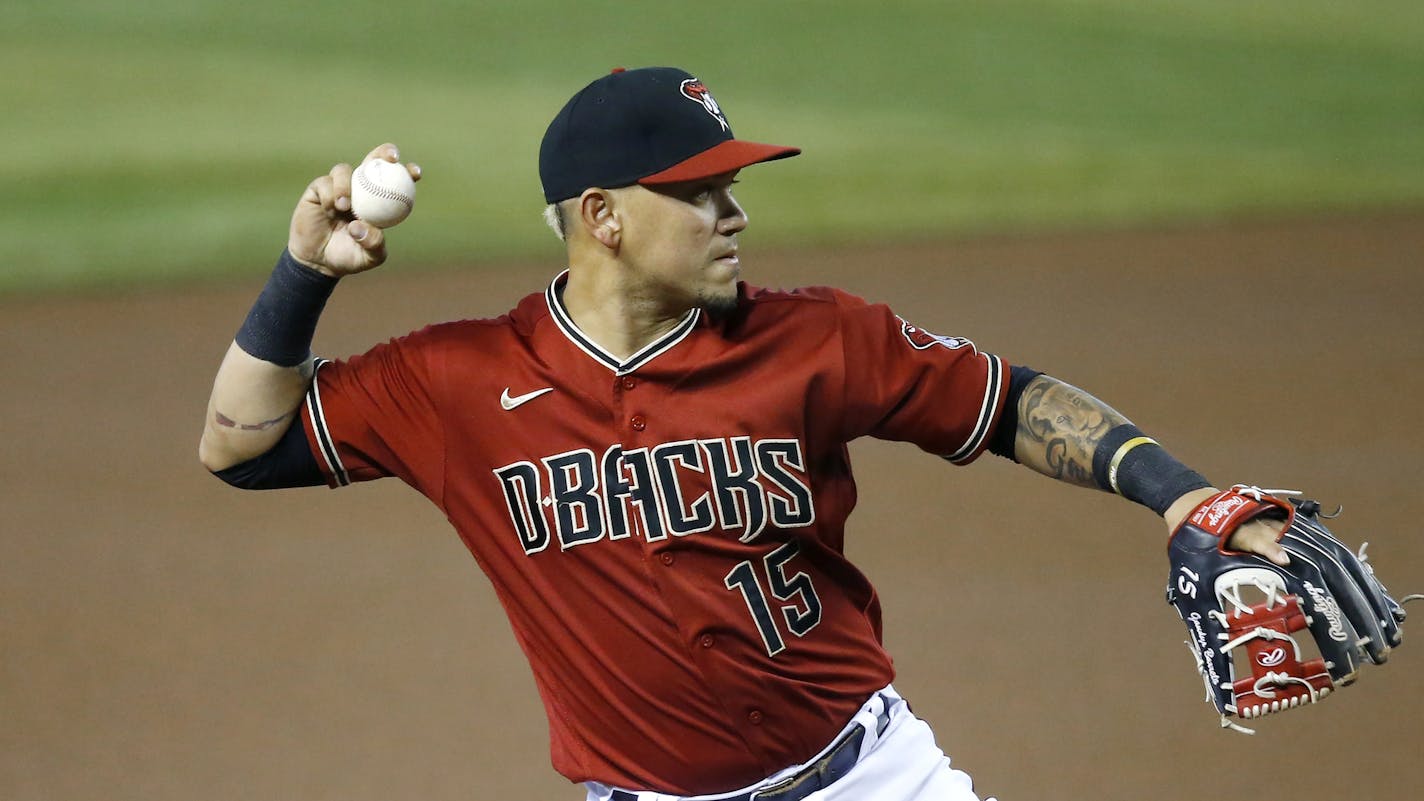 Arizona Diamondbacks third baseman Ildemaro Vargas warms up prior to a baseball game against the Los Angeles Dodgers Sunday, Aug. 2, 2020, in Phoenix. (AP Photo/Ross D. Franklin)