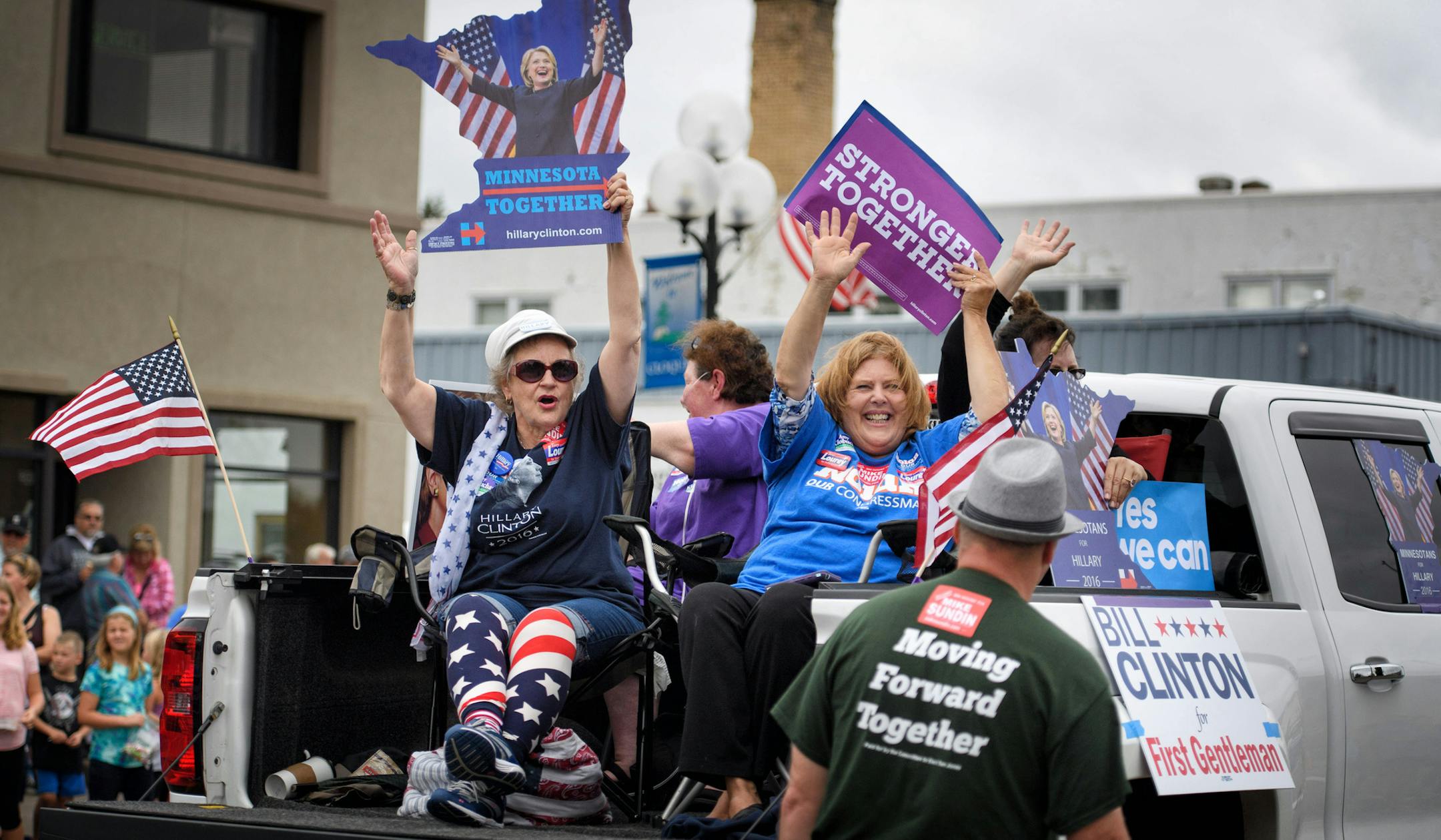 Clinton supporters Patti Murto, Patti McPhail and Judy Quiram rode in the back of a pickup in the Cloquet Labor Day parade. ] GLEN STUBBE * gstubbe@startribune.com Monday, September 5, 2016 Hillary Clinton has a formidable team on the Iron Range to identify supporters and make sure they vote in November. While Donald Trump has relied on high-profile events, Clinton's widening organizational effort on the Iron Range mirrors the get-out-the-vote effort that will be critical in battleground states