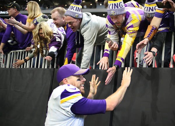 Minnesota Vikings quarterback Case Keenum (7) celebrated with fans a Vikings 14-9 win at Mercedes -Benz Stadium Sunday December 3, 2017 in Atlanta, GA