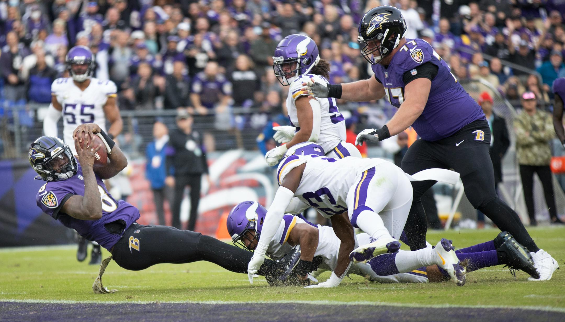 Minnesota Vikings cornerback Camryn Bynum (43) stops Baltimore Ravens quarterback Lamar Jackson (8), from scoring a touchdown  =at the one yard in the fourth quarter.