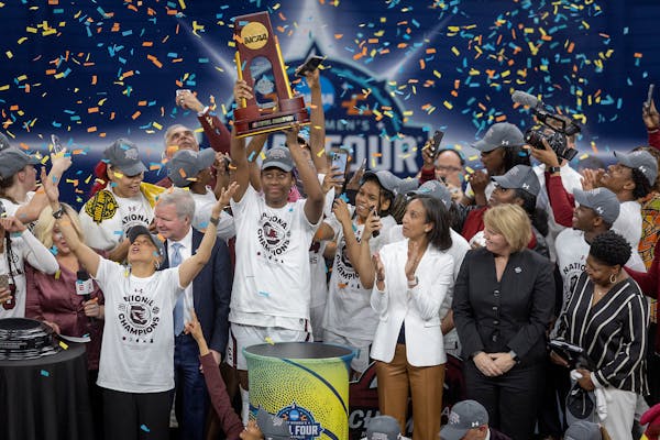 The South Carolina team celebrated their 64-49 win over UConn.