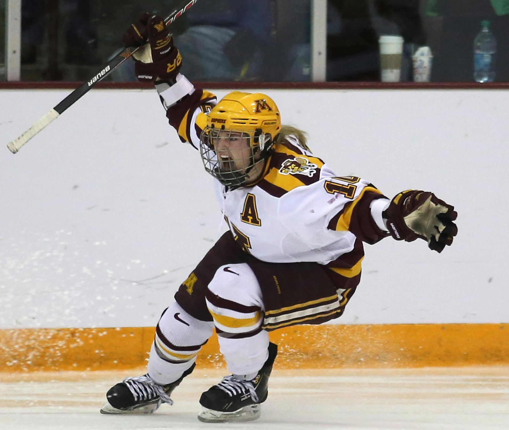Gopher Kelly Terry celebrated after scoring her third goal , a hat trick during the third period. ] (KYNDELL HARKNESS/STAR TRIBUNE) kyndell.harkness@startribune.com Gopher women's hockey played Boston University in the quarterfinals of the NCAA championship at Ridder Arena in Minneapolis, Min, Saturday March 15, 2014. Gophers won over Boston University 5-1.