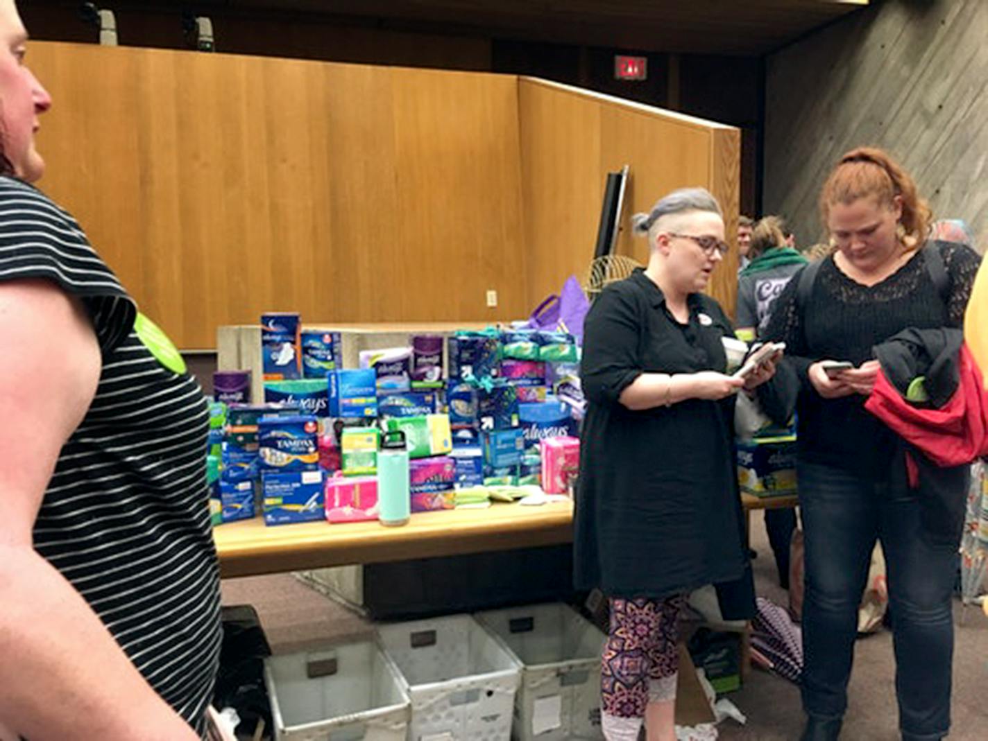 In a protest over what they perceive as sexist attitudes on the West St. Paul City Council, residents brought boxes of tampons and maxi pads to the council meeting Monday night. (Erin Adler/Minneapolis Star Tribune/TNS) ORG XMIT: 1231138