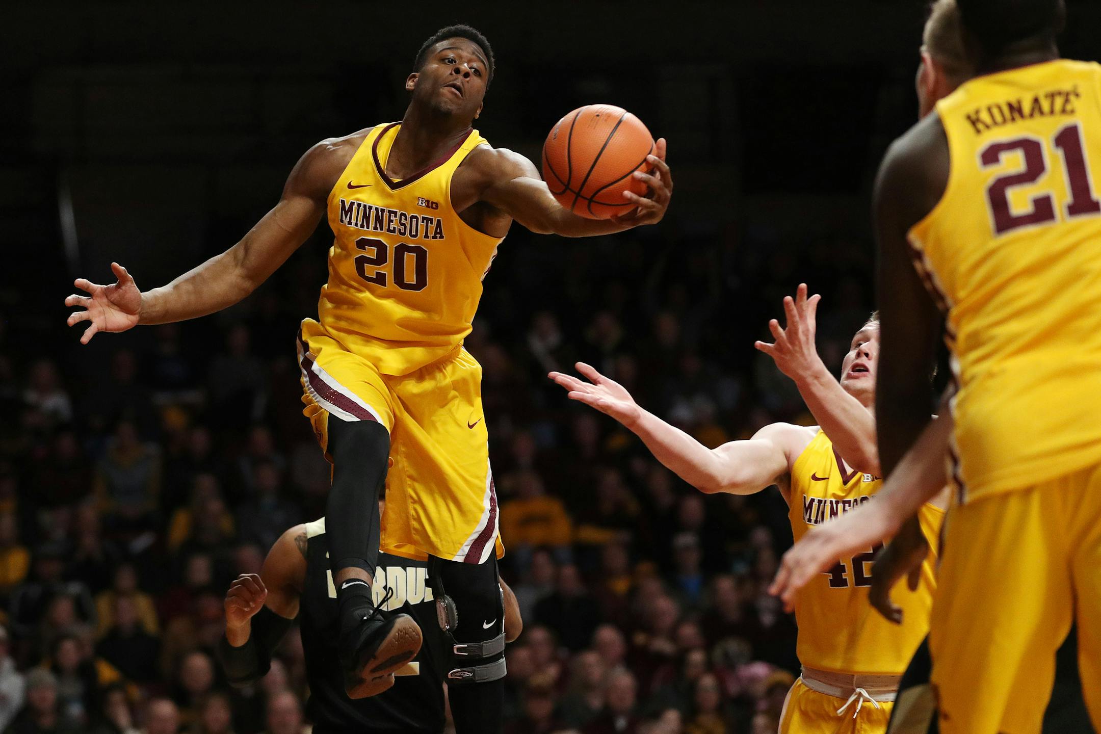 Davonte Fitzgerald grabbed a rebound against Purdue on Jan. 13 at Williams Arena.