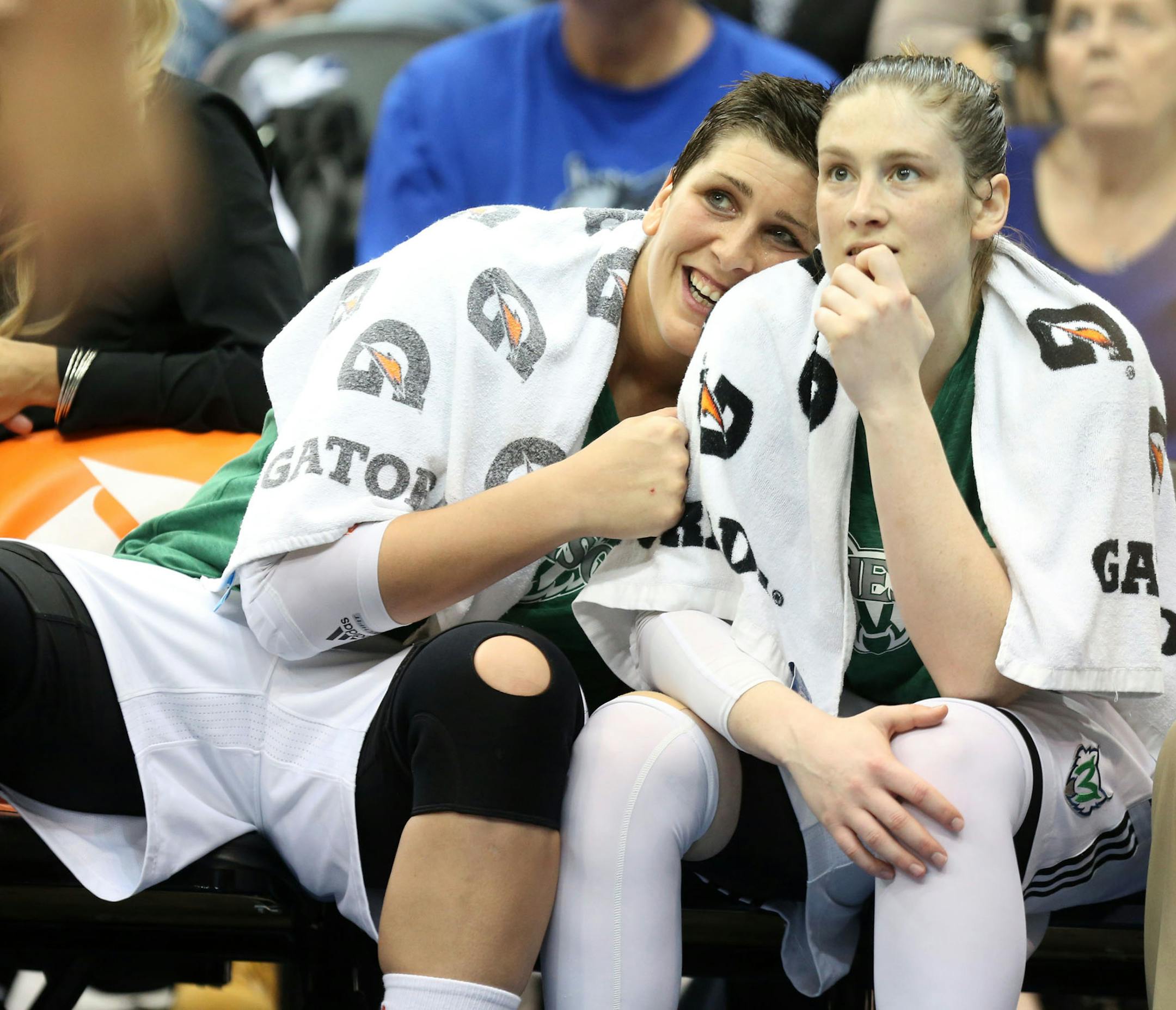 Minnesota center Janel McCarville (4) and Minnesota guard Lindsay Whalen (13) joked around on the bench near the end of the second half of the first game in the WNBA Western Conference Finals at Target Center in Minneapolis, Thursday September 26, 2013. Lynx won over Mercury 85-62. ] (KYNDELL HARKNESS/STAR TRIBUNE) kyndell.harkness@startribune.com