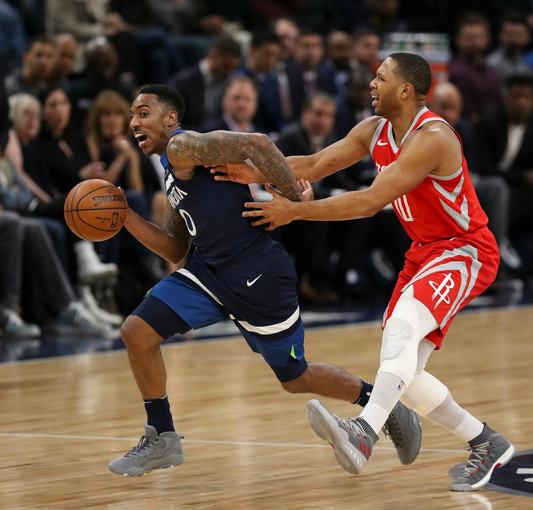Minnesota Timberwolves guard Jeff Teague (0) was fouled by Houston Rockets guard Eric Gordon (10) in the third quarter.