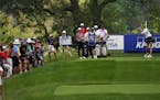 A crowd gathered to watch Michelle Wie as she teed off on the 17th hole. ] ANTHONY SOUFFLE &#x2022; anthony.souffle@startribune.com Golfers took part 