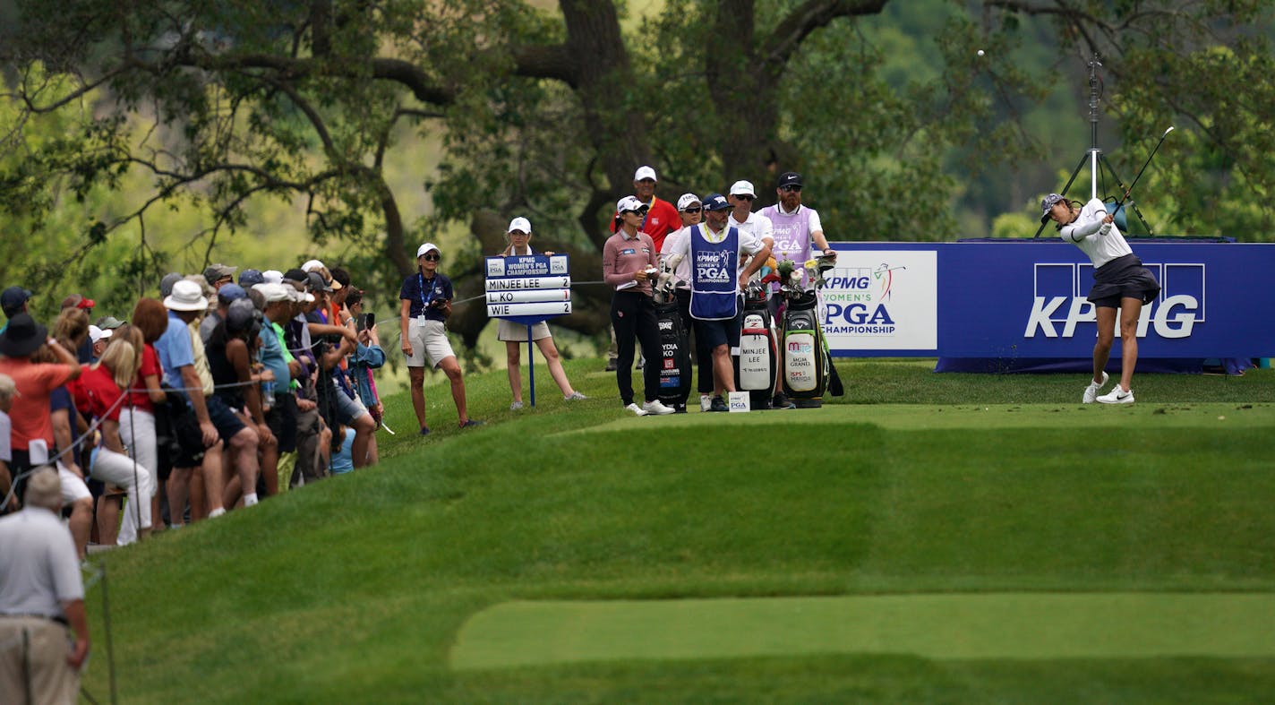 A crowd gathered to watch Michelle Wie as she teed off on the 17th hole. ] ANTHONY SOUFFLE &#x2022; anthony.souffle@startribune.com Golfers took part in the first day of competition play during the KPMG Women's PGA Championship Tournament Thursday, June 20, 2019 at Hazeltine National Golf Club in Chaska, Minn.