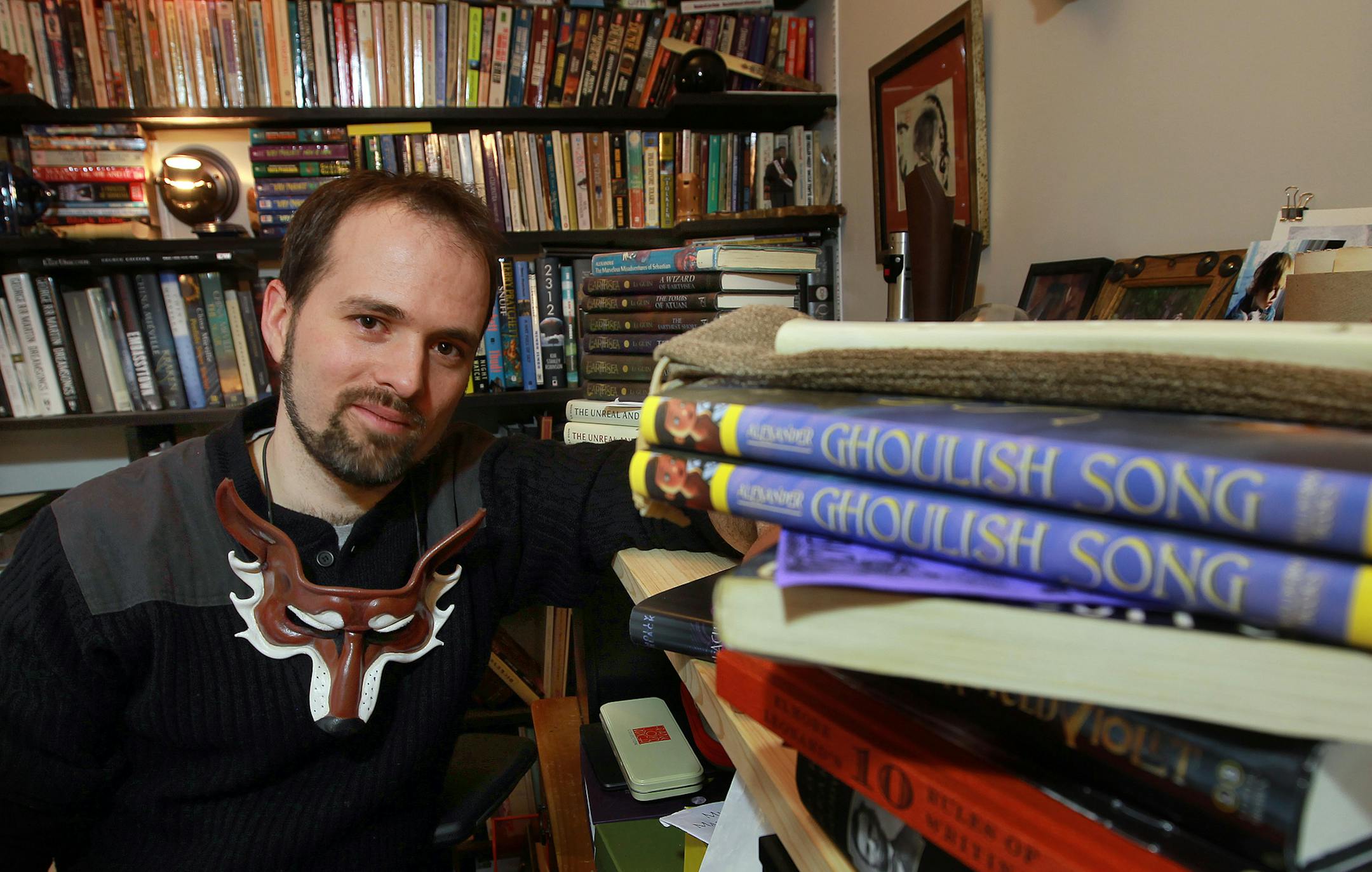 Minneapolis writer Will Alexander, in his home office, whose first novel, "Goblin Secrets," was the surprise winner last fall of the National Book Award. His second book, "Ghoulish Songs," publishes, March 5, 2013. ] TOM WALLACE • twallace@startribune.com _ Assignments #20027742A_ February 20, 2013_ SLUG: 586832 ALEXANDER030213_ EXTRA INFORMATION: 586832 A profile of young Minneapolis writer Will Alexander. He works at a stand-up desk, works at home.He's taking care of his kids, a toddler