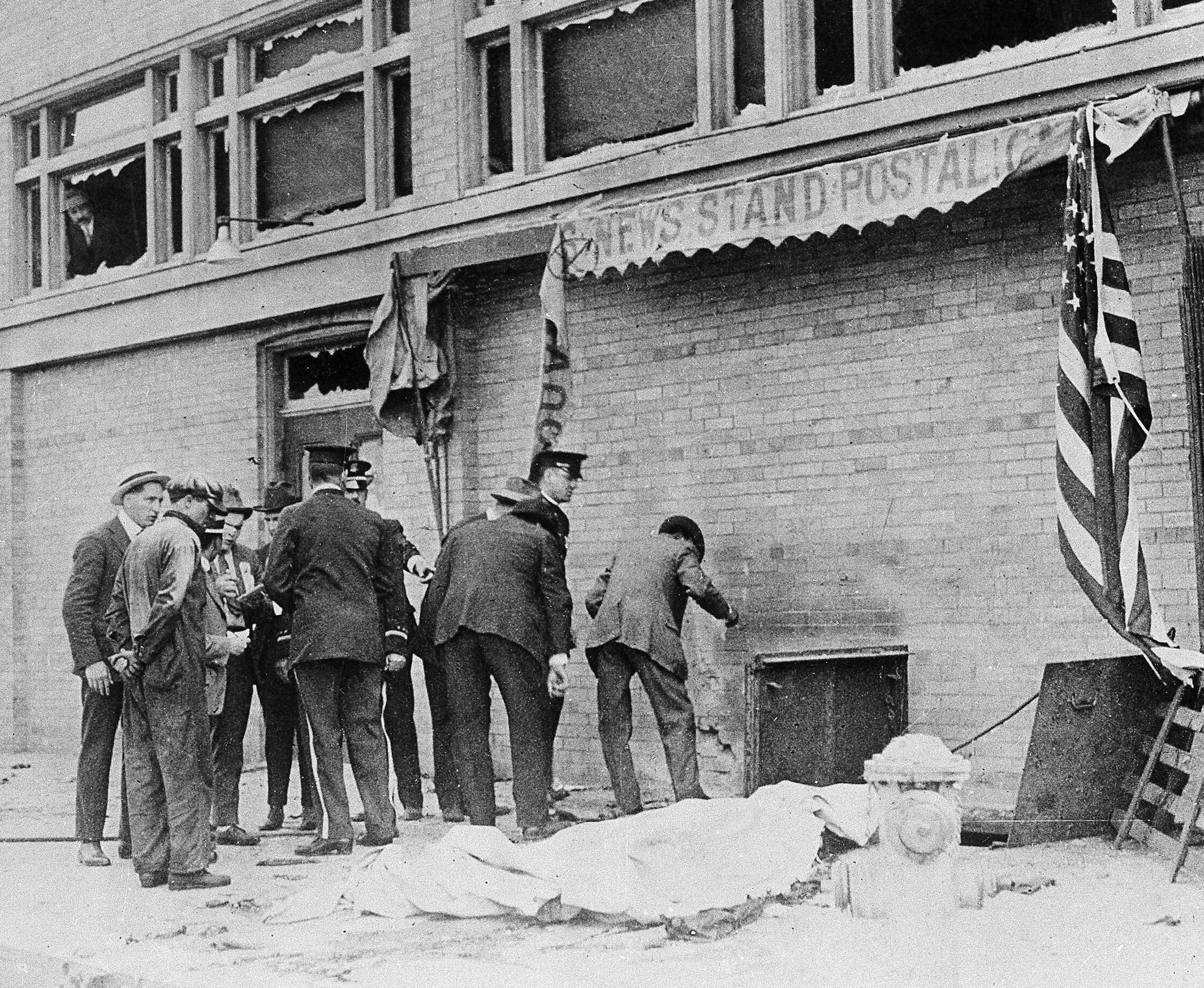 Police and officials inspect the area where a bomb exploded during the Preparedness Day parade in San Francisco, Calif., July 22, 1916. Ten people were killed in the blast and forty wounded. Two labor leaders, Tom Mooney and Warren K. Billings, were convicted of the crime and were sentenced to life in prision, but were pardoned in 1939. (AP Photo) ORG XMIT: APHS86227