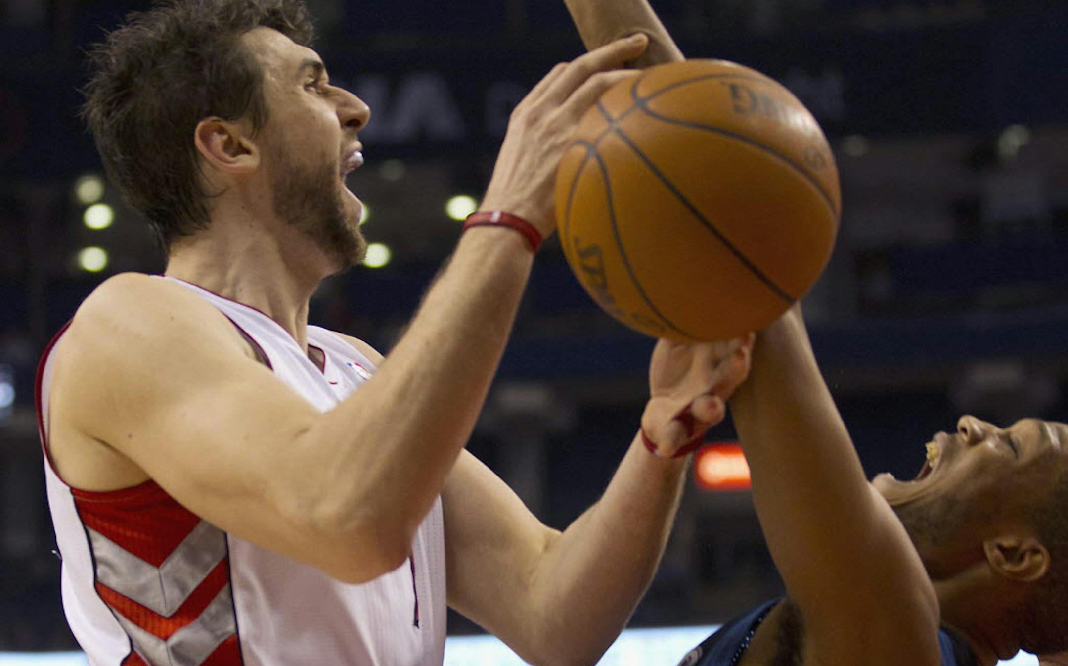 Toronto's Andrea Bargnani, left, collided with Wolves forward Anthony Randolph.
