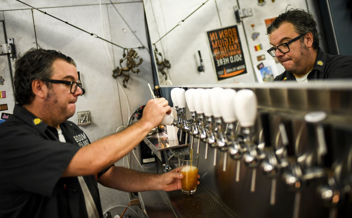 Taproom manager Jim Barnard, of Robbinsdale, poured a beer for a customer Tuesday. He's been an employee of Boom Island Brewing for five years. ] AARON LAVINSKY &#x2022; aaron.lavinsky@startribune.com