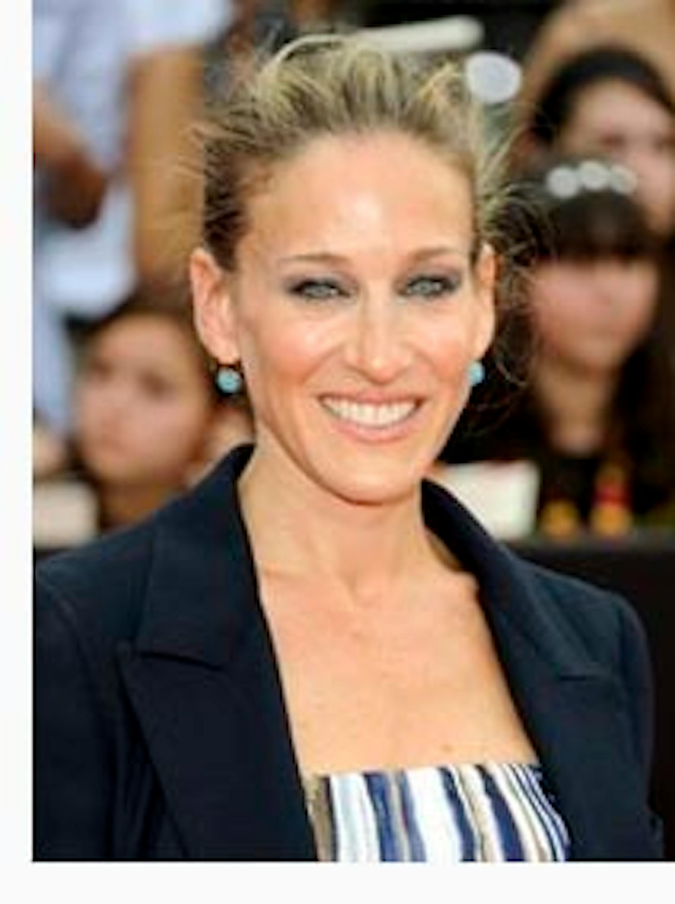 FILE - In this July 11, 2011, file photo, actress Sarah Jessica Parker attends the premiere of "Harry Potter and the Deathly Hallows: Part 2" at Avery Fisher Hall in New York. Parker says she's 'battening down the hatches' in preparation for Hurricane Irene. The actress, while promoting her new comedy, 'I Don't Know How She Does It' Thursday, Aug. 25, 2011 in New York, said she's removing anything that could fly through windows and making sure she and husband, Matthew Broderick, 2-year-old twins Loretta and Tabitha, and eight-year-old James Wilkie, are stocked up on water and flashlights and batteries. (AP Photo/Evan Agostini, file)