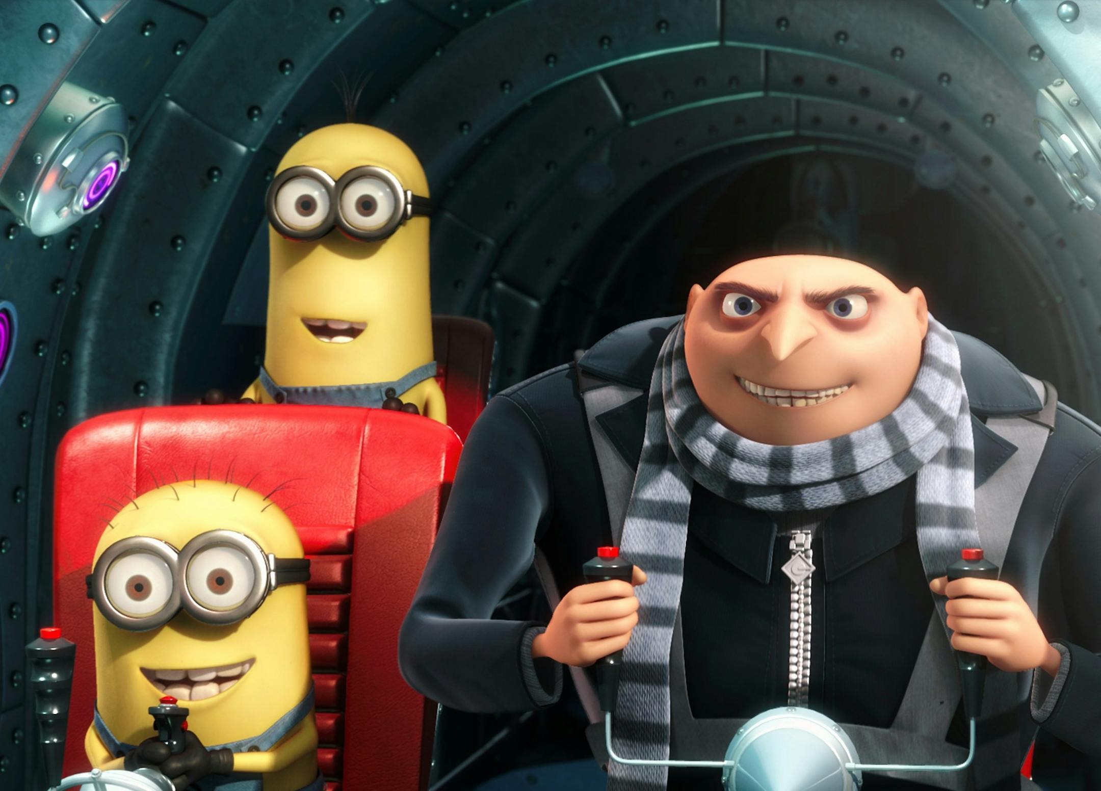 In this film publicity image released by Universal Pictures, Gru, voiced by Steve Carell, is shown with two of his minions in a scene from the 3-D CGI feature, "Despicable Me", about a villain who meets his match in three little girls. (AP Photo/Universal Pictures - Illumination Entertainment)