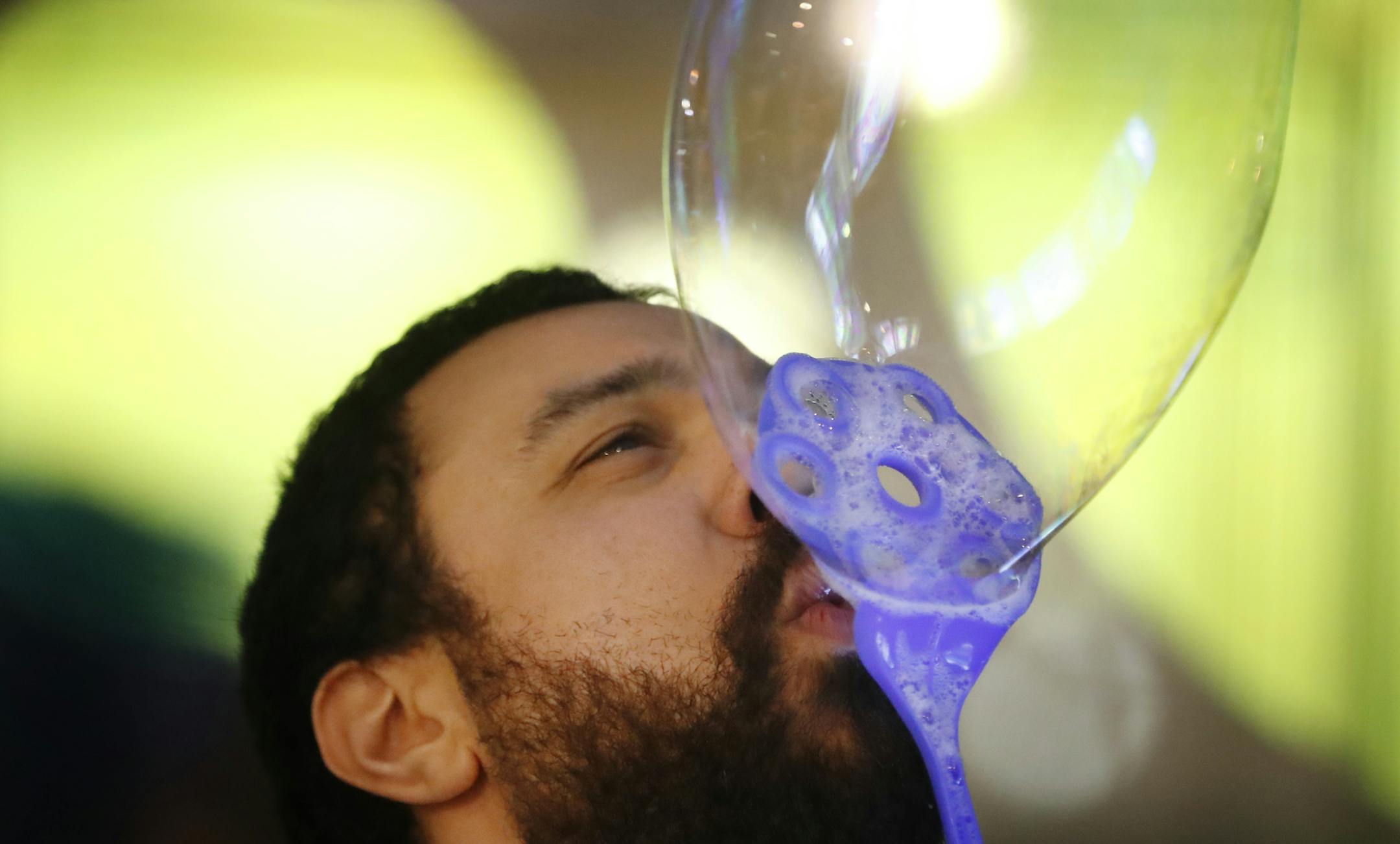 A scientist by day, Franklin Adams tries to blow bubbles at night.