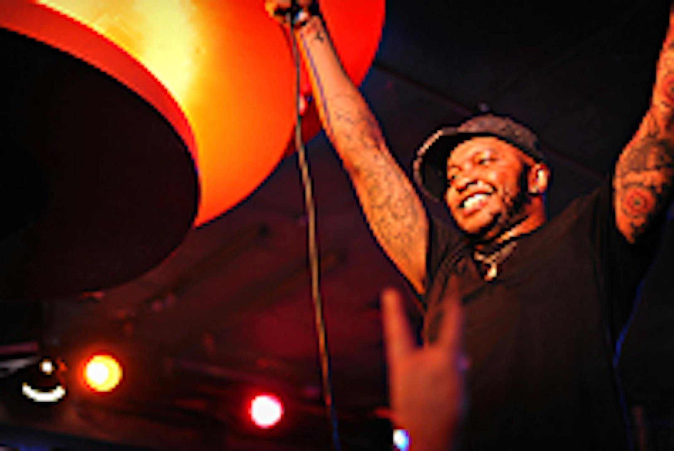 P.O.S. ends his last song with a giant "Tada!" at his Turf Club show on Monday.