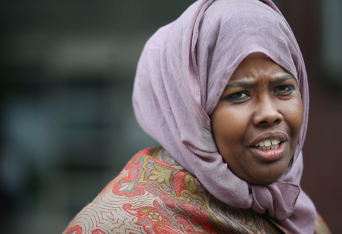 Ayan Farah, the mother of two of the young men standing trial in opening day of the ISIL recruit trial, spoke to the media about the hearing regarding their lawyer, in front of the United States Courthouse, Monday, May 9, 2016 in Minneapolis, MN. ] (ELIZABETH FLORES/STAR TRIBUNE) ELIZABETH FLORES &#x2022; eflores@startribune.com