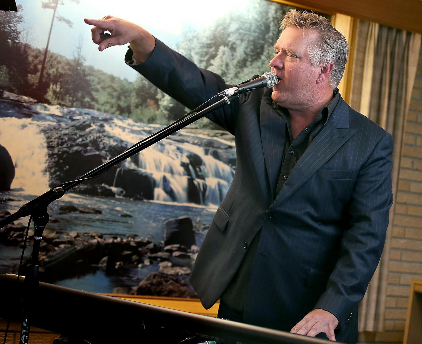 Chan Poling, lead vocals and keyboards for The Suburbs, rehearsed Tuesday, September 17, 2014 in a Southwest Minneapolis basement. ] (ELIZABETH FLORES/STAR TRIBUNE) ELIZABETH FLORES &#x2022; eflores@startribune.com