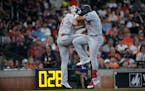 Minnesota Twins' Royce Lewis (23) celebrates with Alex Kirilloff after both scored on Lewis' three-run home run against the Houston Astros during the 