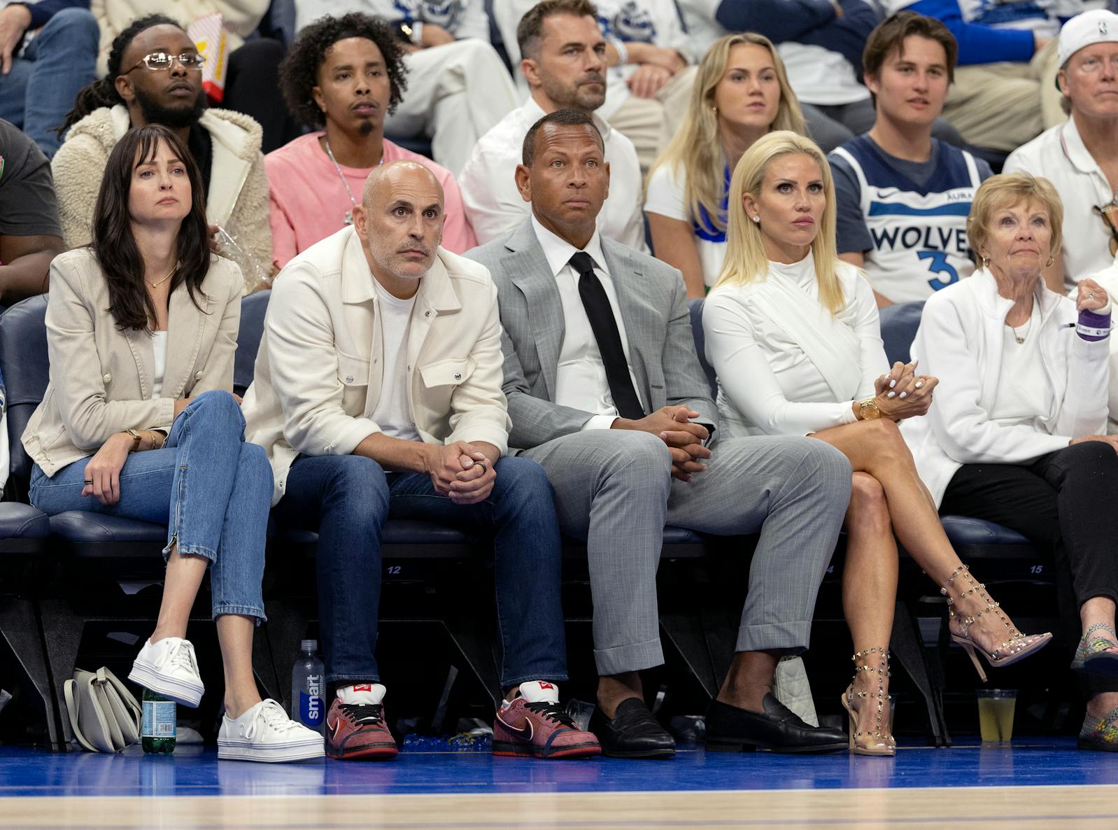Marc Lore and Alex Rodriguez watch a Timberwolves playoff game in May, 2024, at Target Center.