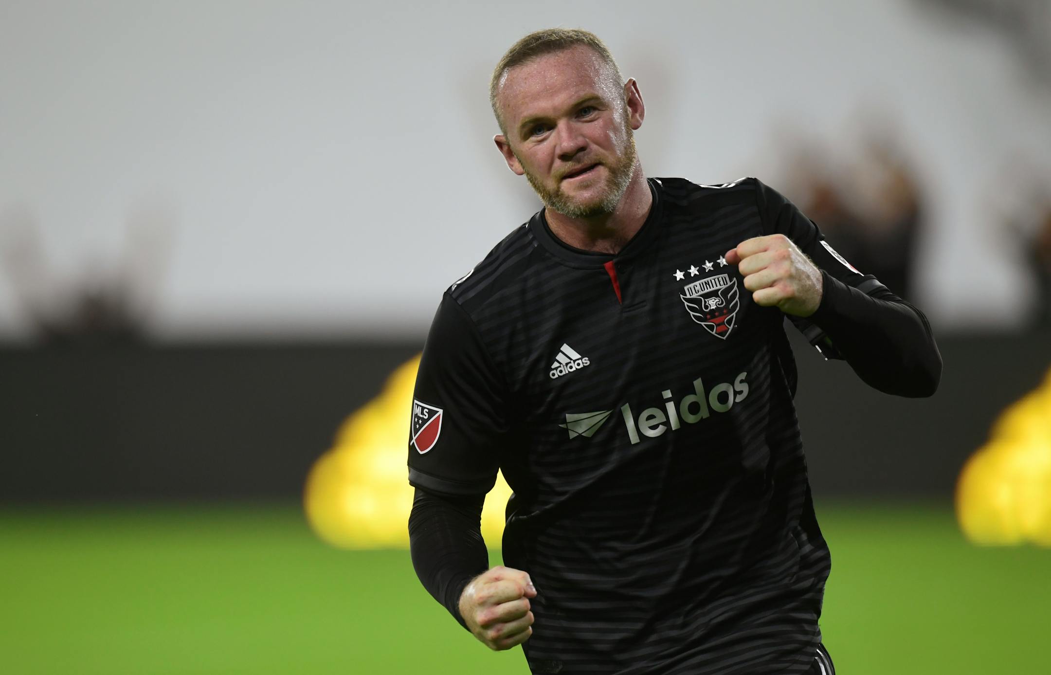 D.C. United forward Wayne Rooney celebrates his first MLS goal during the first half of a soccer match against the Colorado Rapids in Washington, Saturday, July 28, 2018. (AP Photo/Susan Walsh)