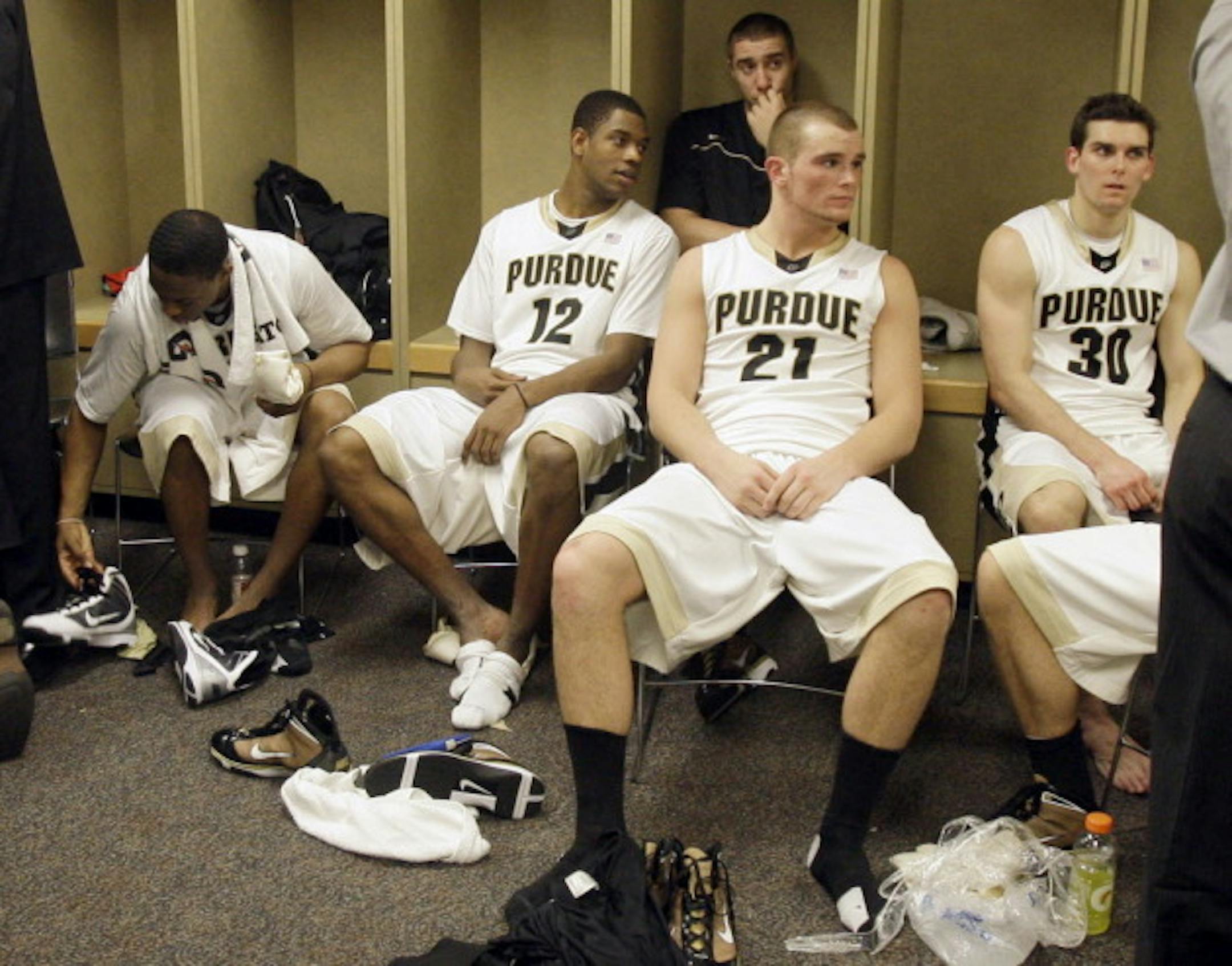 After an early-morning incident at a bar, Kelsey Barlow (left center) was dismissed and D.J. Byrd (right center) suspended for a game.