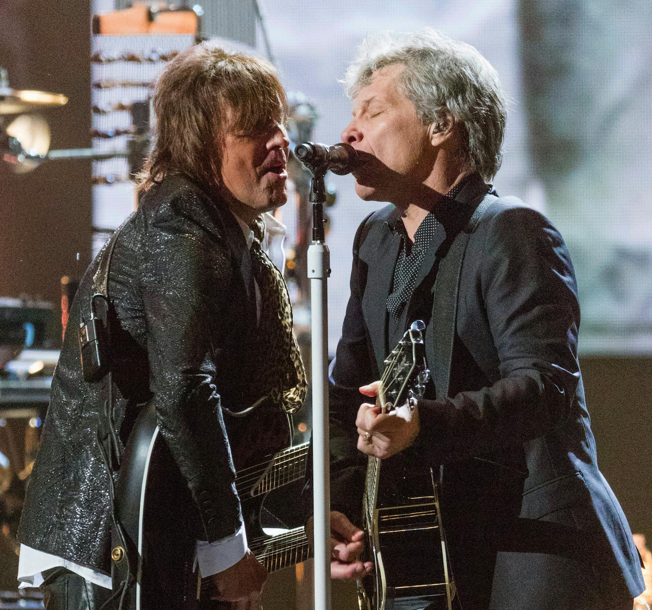 Richie Sambora, left, and Jon Bon Jovi perform together at the 2018 Rock and Roll Hall of Fame induction ceremony at Cleveland Public Auditorium on April 14, 2018, in Cleveland, Ohio. (Photo by Michael Zorn/Invision/AP)
