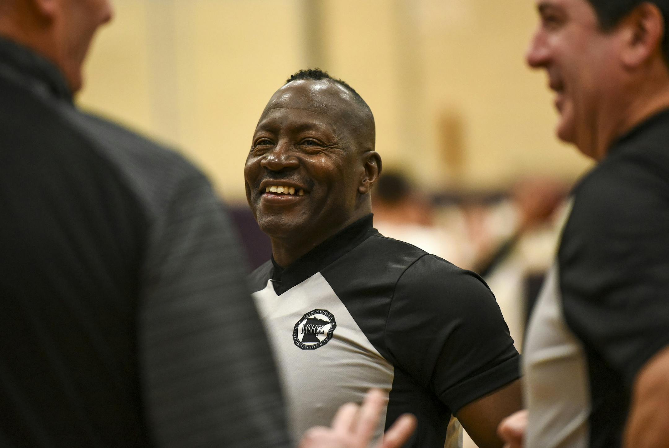 Minnesota High School Basketball Hall of Fame inductee Ronnie Henderson joked with his fellow officials and coaches before refereeing a game between Minneapolis Southwest and Fridley Thursday night.