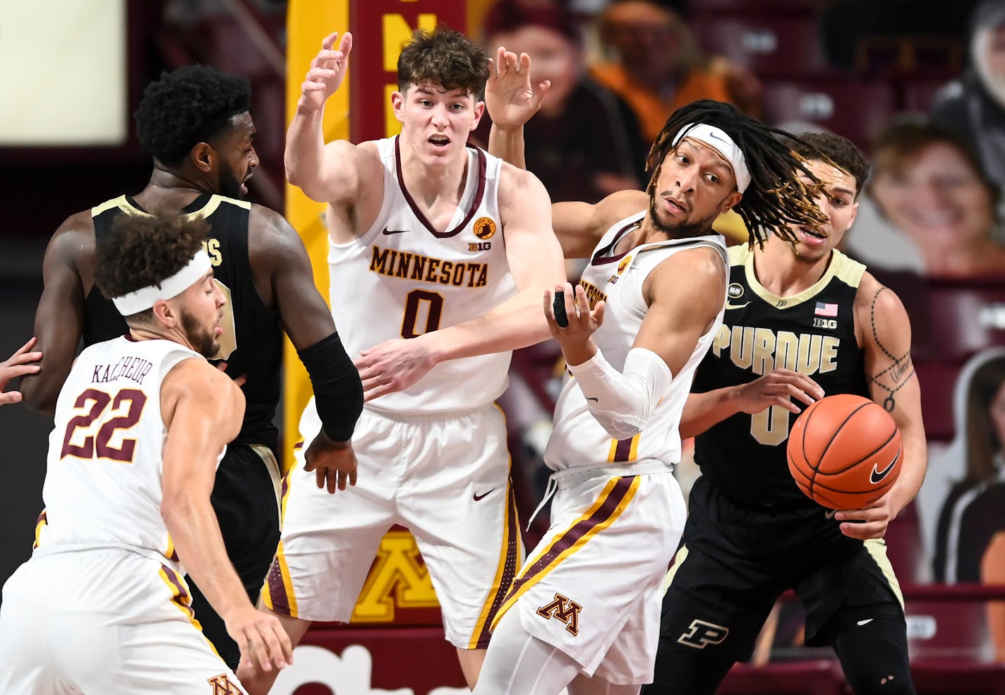 Minnesota Gophers guard Gabe Kalscheur (22), center Liam Robbins (0) and forward Brandon Johnson (23) looked to get a rebound against Purdue Boilermakers forward Trevion Williams (50) and forward Mason Gillis (0) in the first half. ] AARON LAVINSKY • aaron.lavinsky@startribune.com