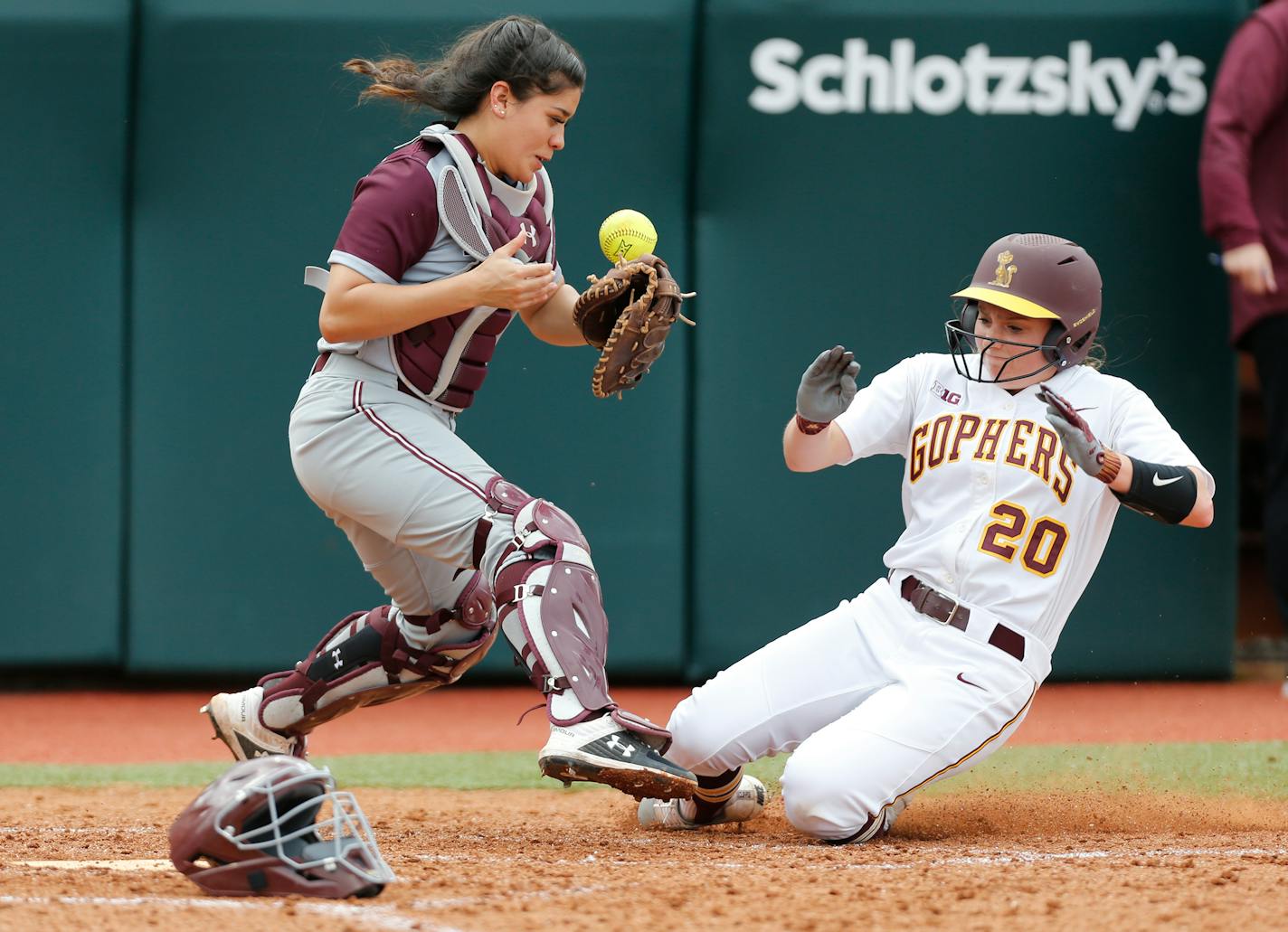 Maddie Houlihan (shown trying to score against Texas Southern in March) went 3-for-3, including a go-ahead RBI single in the fifth inning, in leading the Gophers over Nebraska 9-3.