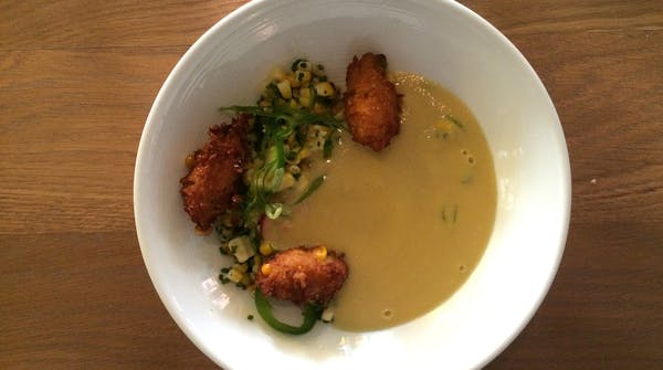Lobster fritters add texture to the sweet corn soup at Eastside.