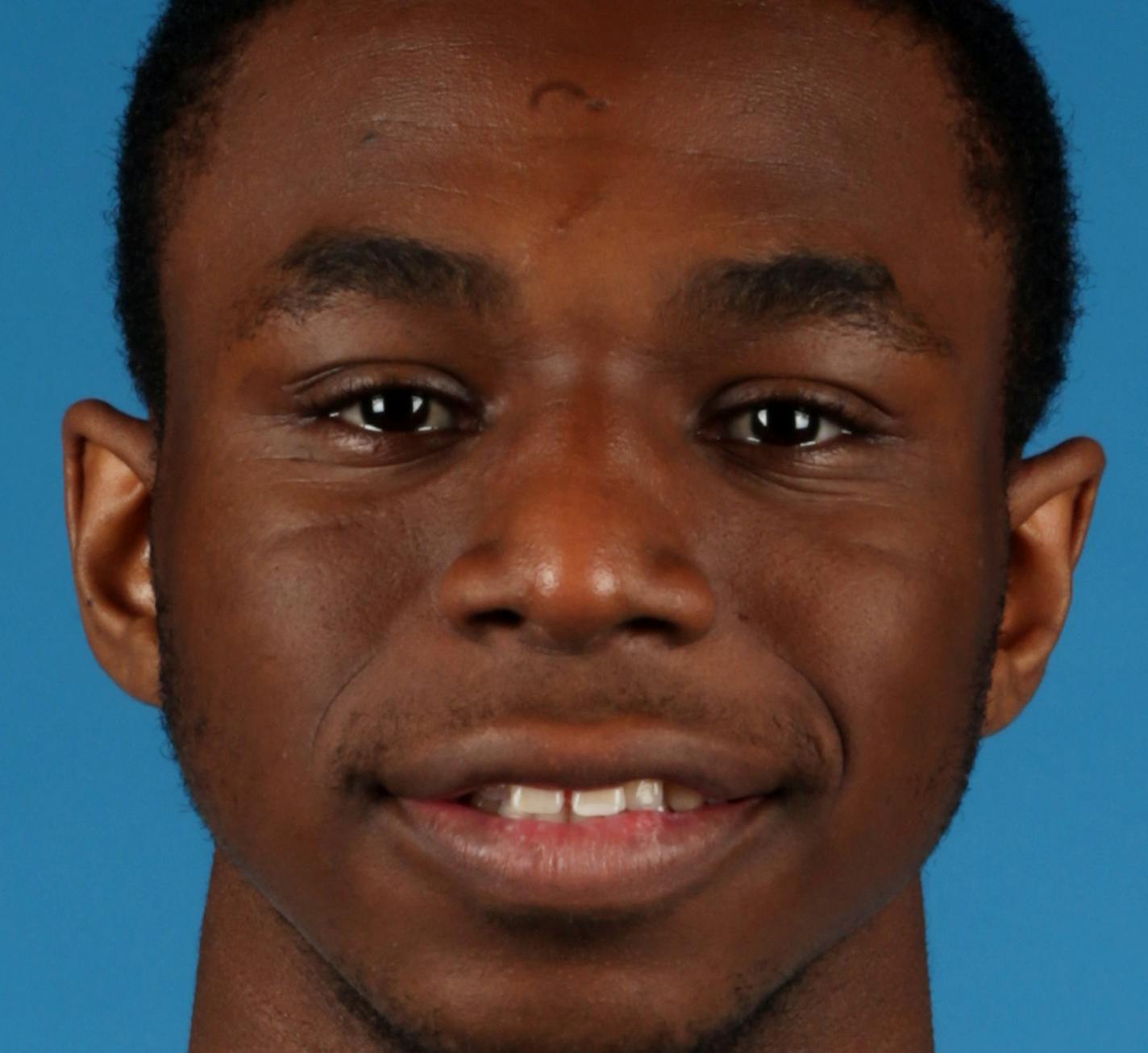 Minnesota Timberwolves' Andrew Wiggins poses for media day photos Monday, Sept. 29, 2014, in Minneapolis. (AP Photo/Jim Mone) ORG XMIT: MP10