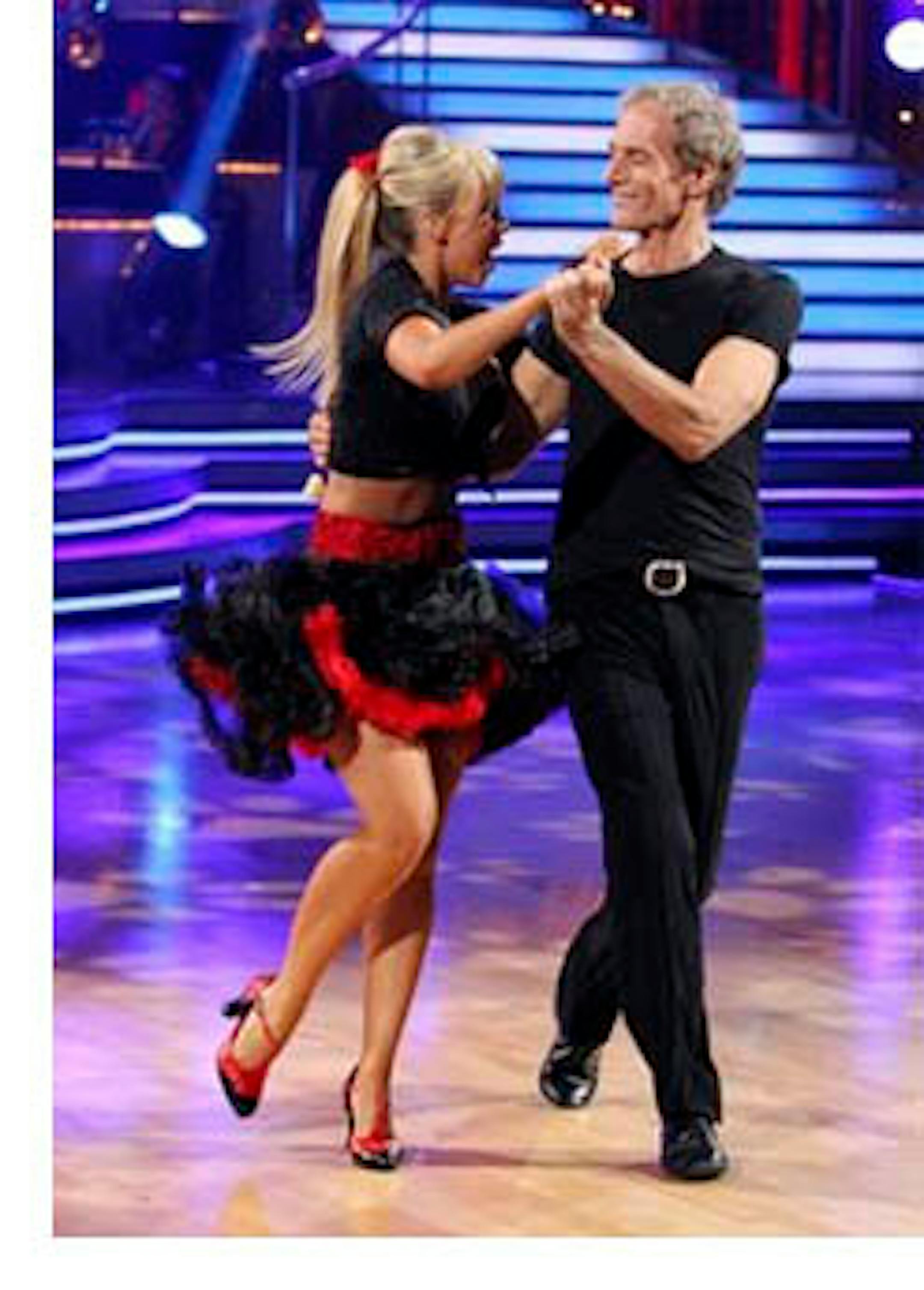In this publicity image released by ABC, Michael Bolton, right, and his partner Chelsie Hightower perform on the celebrity dance competition series "Dancing with the Stars," Monday, Sept. 27, 2010 in Los Angeles. (AP Photo/ABC, Adam Larkey)