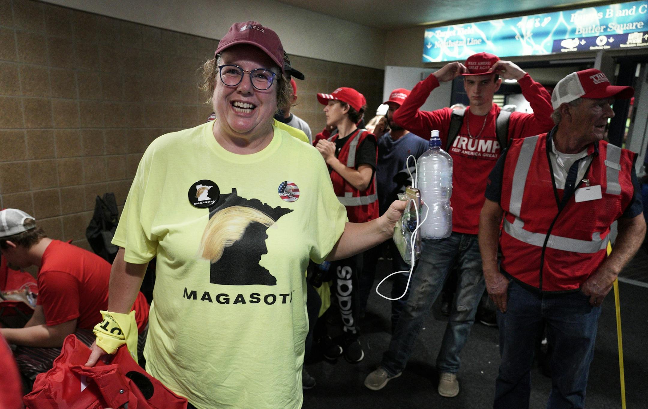 Trump supporter Julie Flatness sported a Magasota T-shirt while waiting in the skyway.