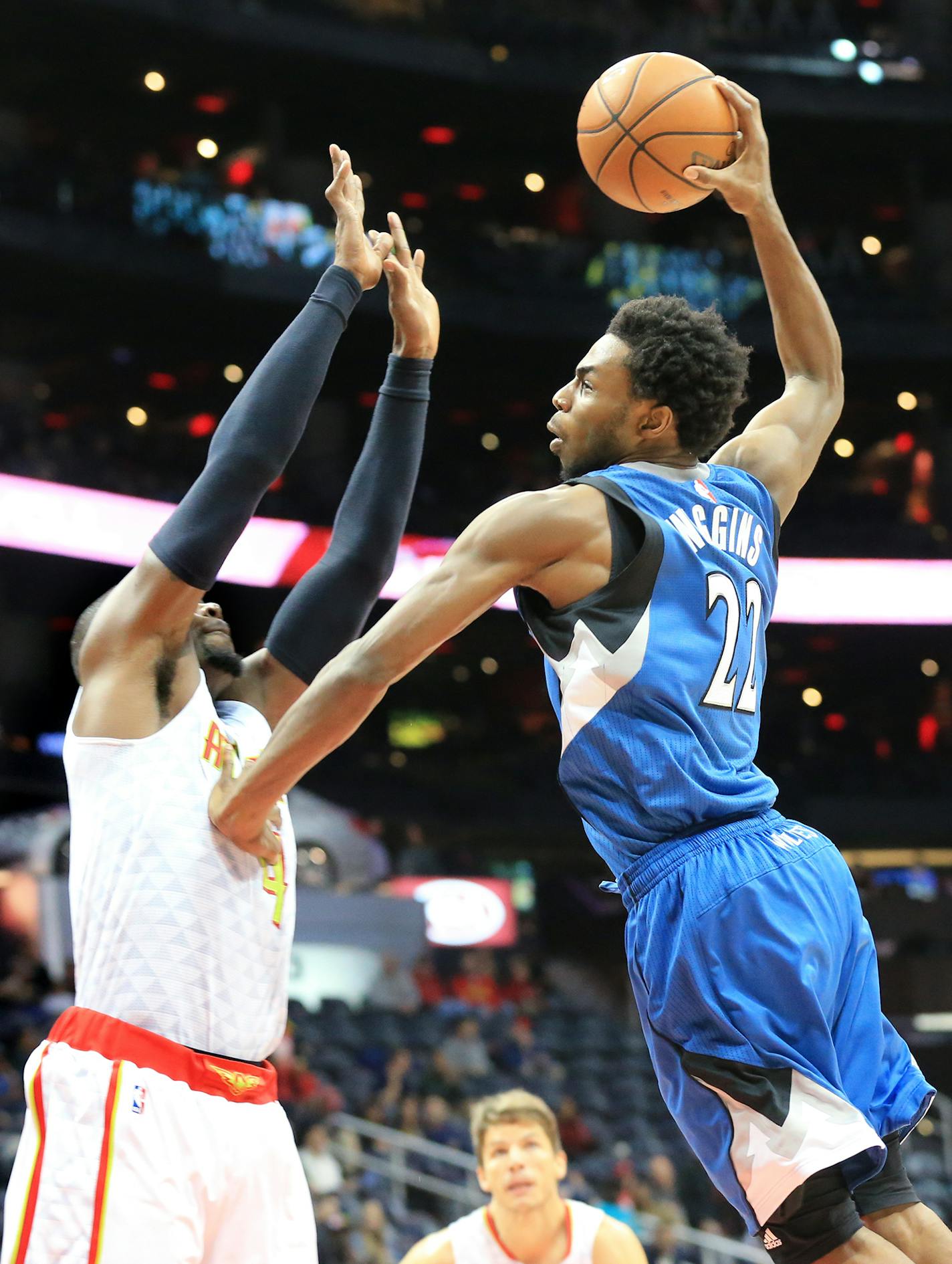 Minnesota Timberwolves' Andrew Wiggins shoots over Atlanta Hawks' Paul Millsap during the second half of an NBA basketball game Monday, Nov. 9, 2015, in Atlanta. (Curtis Compton/Atlanta Journal-Constitution via AP) MARIETTA DAILY OUT; GWINNETT DAILY POST OUT; LOCAL TELEVISION OUT; WXIA-TV OUT; WGCL-TV OUT; MANDATORY CREDIT