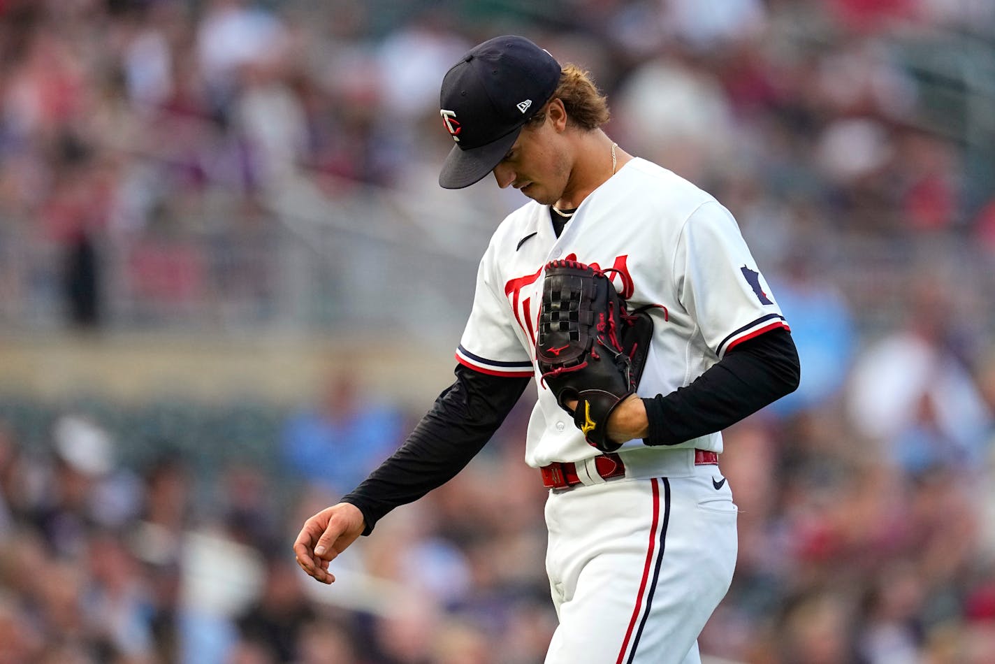 Twins starting pitcher Joe Ryan walks back to the dugout after the top of the fourth inning Friday.