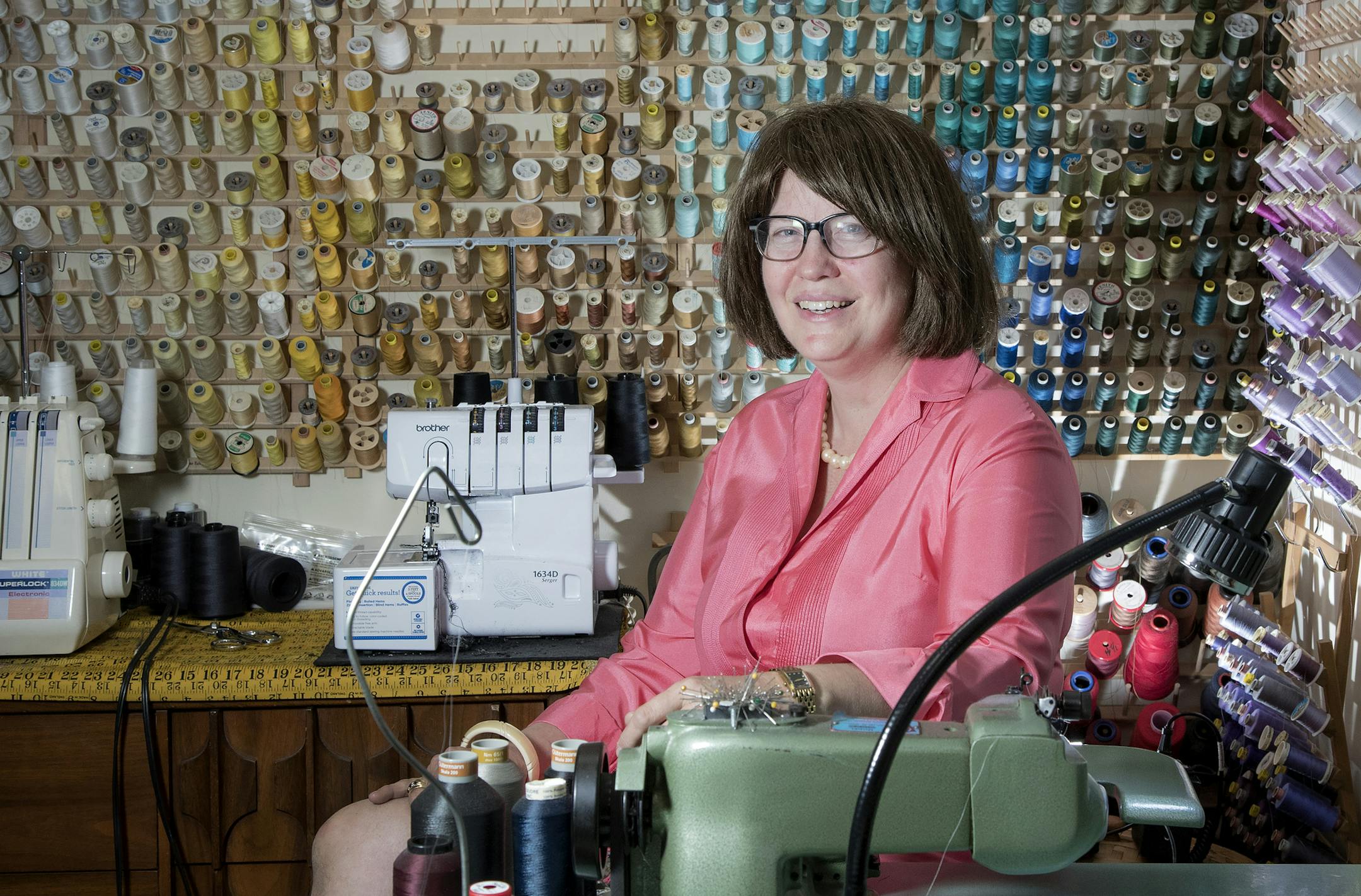 Laurine Lewis has been a tailor for 35 years and owns Sew Biz Tailoring in downtown Minneapolis. ] CARLOS GONZALEZ cgonzalez@startribune.com - September 21, 2016, Minneapolis, MN, Laurine Lewis has been a tailor for 35 years and she owns a shop on Second Avenue where she does a brisk business altering suits and mending all kinds of clothes at Sew Biz Tailoring.