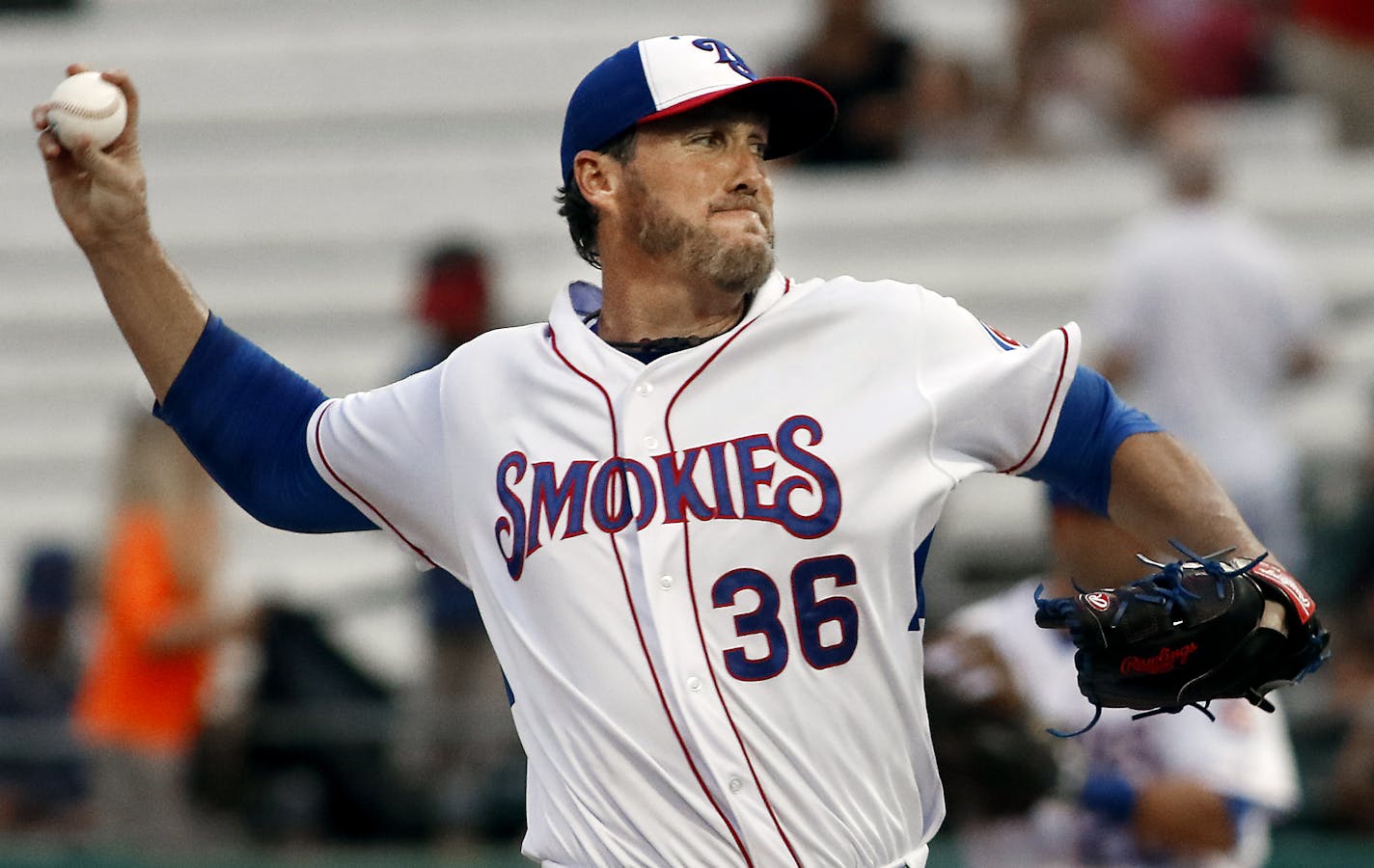 Knoxville Smokies pitcher Joe Nathan hurls a pitch against the Pensacola Blue Wahoos on Thursday, June 23, 2016, in Kodak, Tenn. Nathan is attempting to come back from a second Tommy John surgery at the age of 41 to pursue the biggest item missing from his resume. (Daryl Sullivan/The Daily Times via AP) ORG XMIT: MIN2016071523535012