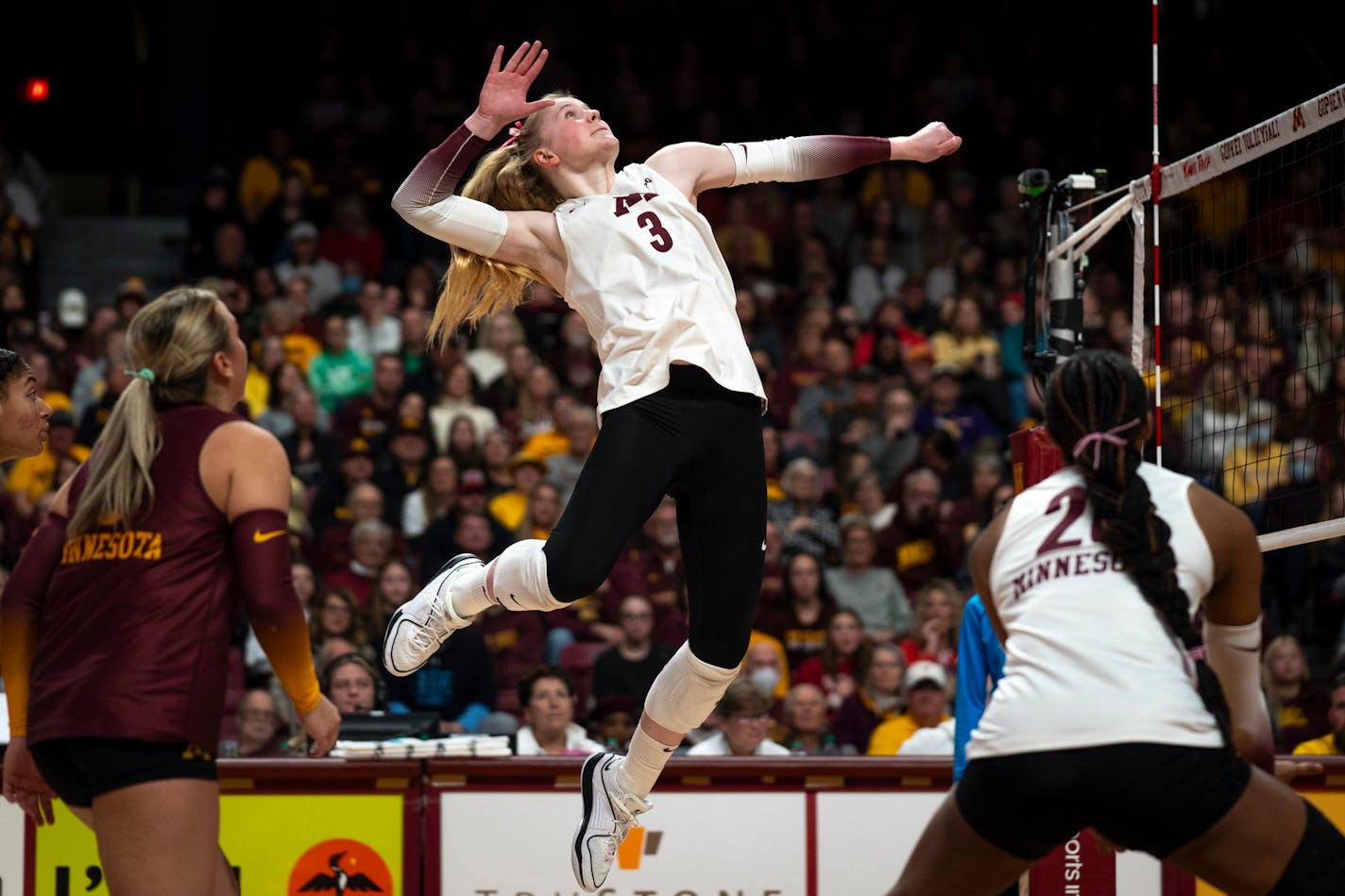 Minnesota outside Mckenna Wucherer (3) spikes the volleyball at game at the Maturi Pavilion in Minneapolis on Saturday, Nov. 25, 2023. ] Angelina Katsanis • angelina.katsanis@startribune.com