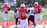 Henry Trost (5) scored four touchdowns in the Johnnies’ 50-0 victory over Augsburg on Oct. 9. 