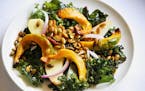 Kale and Roasted Squash Salad With Spiced Pumpkin seeds.