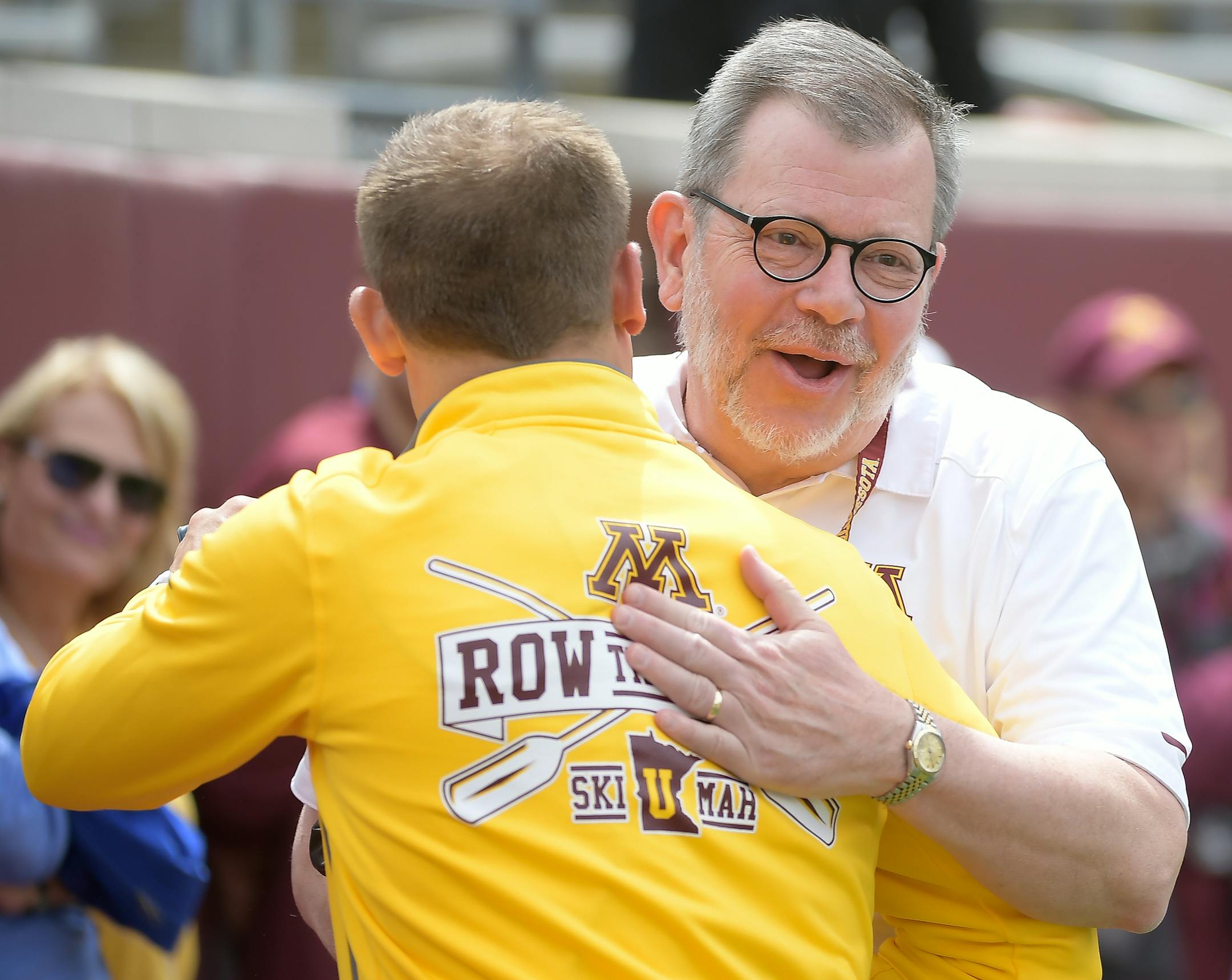 University of Minnesota president Eric Kaler greeted football coach P.J. Fleck at the 2017 spring game.