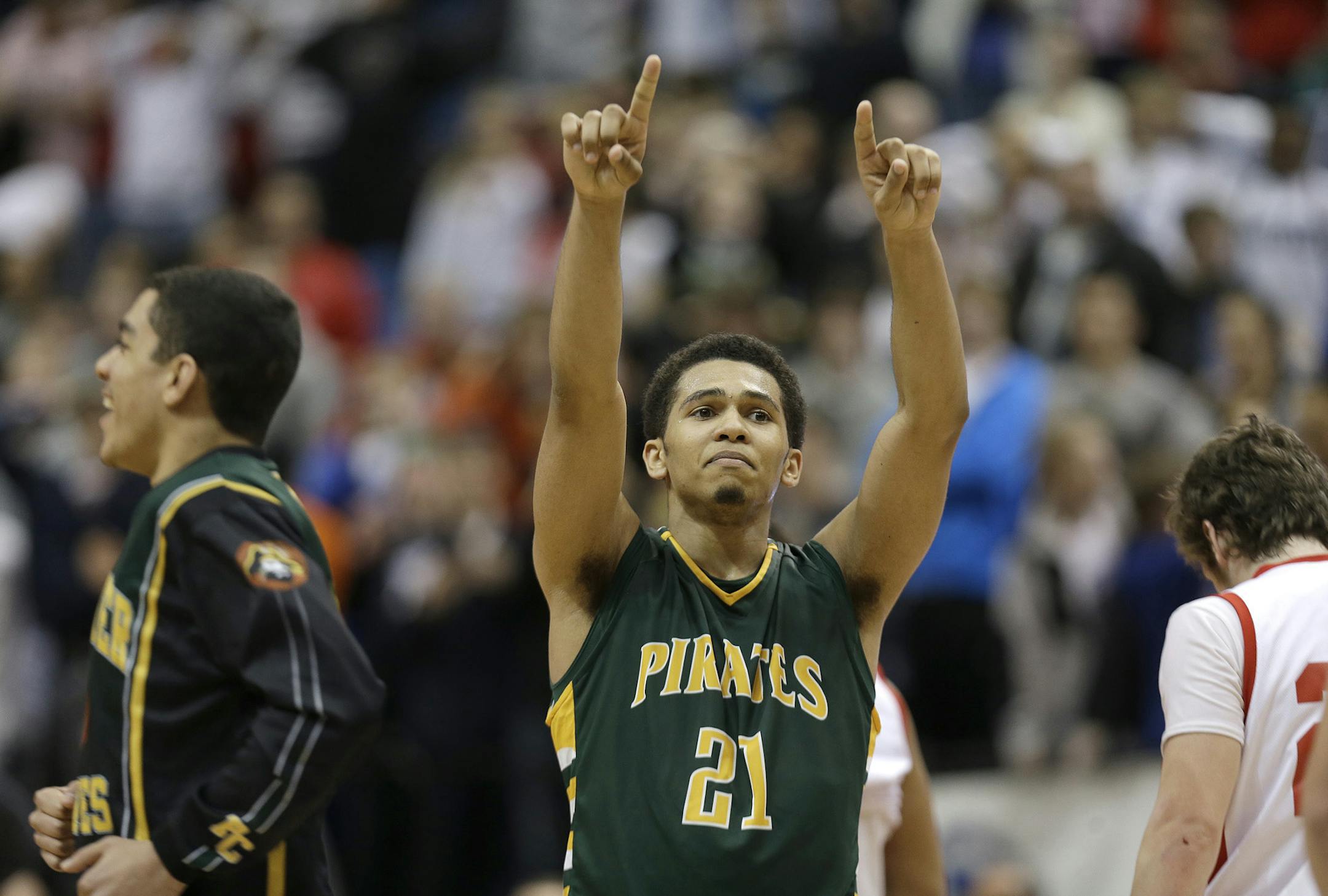 Park Center's Quinton Hooker celebrated the overtime win over Lakeville North at the boys' basketball quarterfinals at the Target Center, Wednesday, March 20, 2013 in Minneapolis, MN. Park Center won over Lakeville North in overtime 74-72. (ELIZABETH FLORES/STAR TRIBUNE) ELIZABETH FLORES ¬• eflores@startribune.com ORG XMIT: MIN1303201617242458