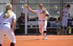 Minnesota infielder Katelyn Kemmetmueller (10) throws to first base during an NCAA college softball game against Rutgers on Friday, March 12, 2021, in
