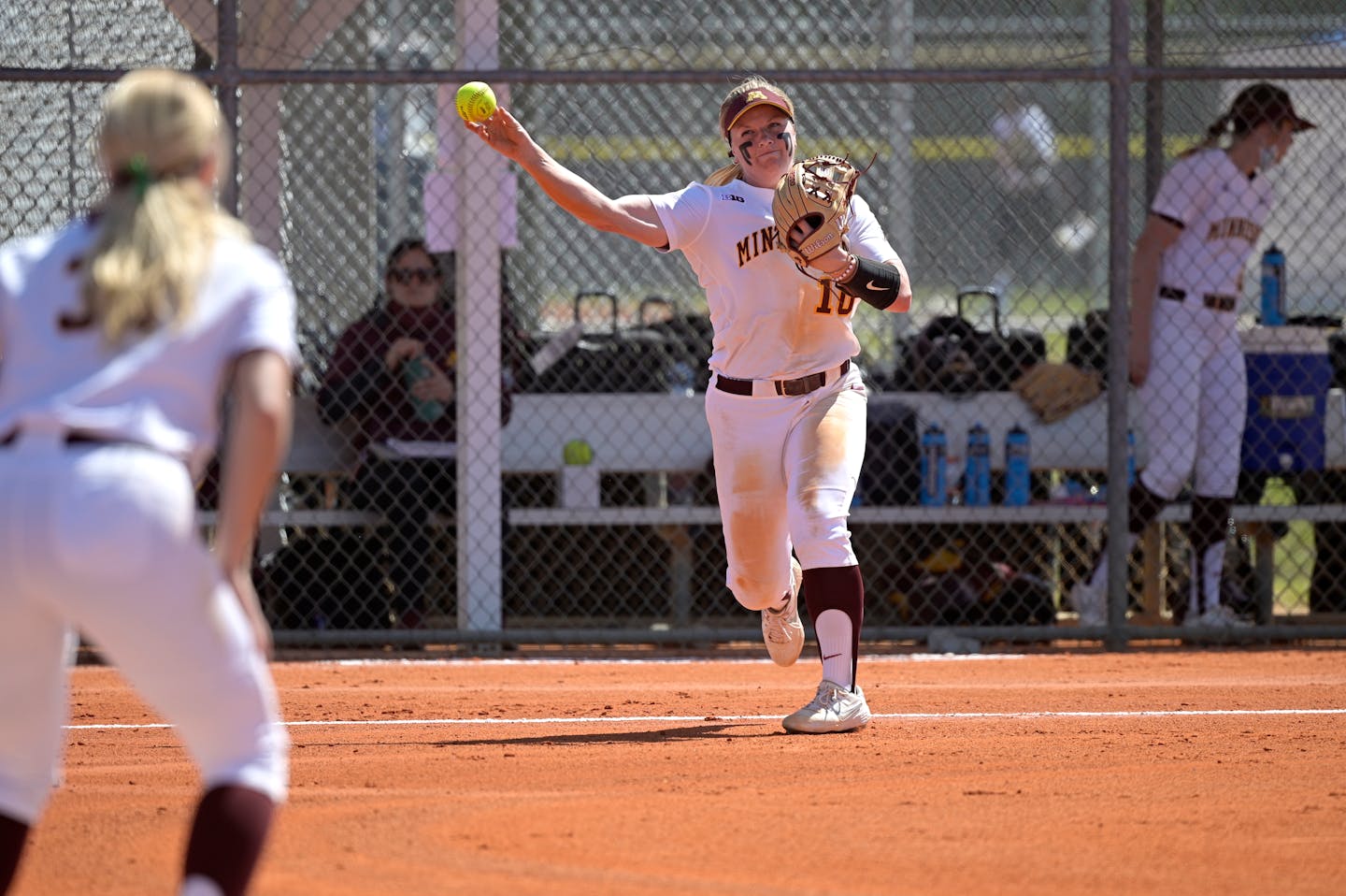 Minnesota infielder Katelyn Kemmetmueller (10) throws to first base during an NCAA college softball game against Rutgers on Friday, March 12, 2021, in Leesburg, Fla. (AP Photo/Phelan M. Ebenhack)