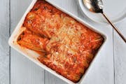 Creamy chicken and spinach manicotti is comfort in a 9-by-13 pan.