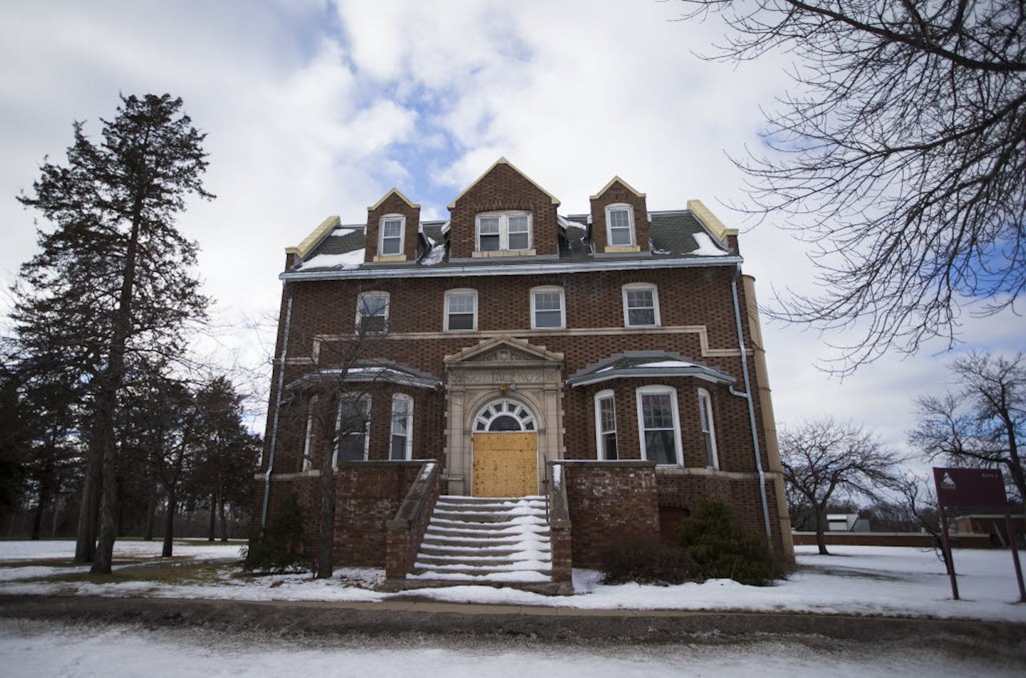 One of three boarded-up cottages at the former Anoka State Hospital in the city of Anoka, which have been at the heart of a lease dispute between the city and county.